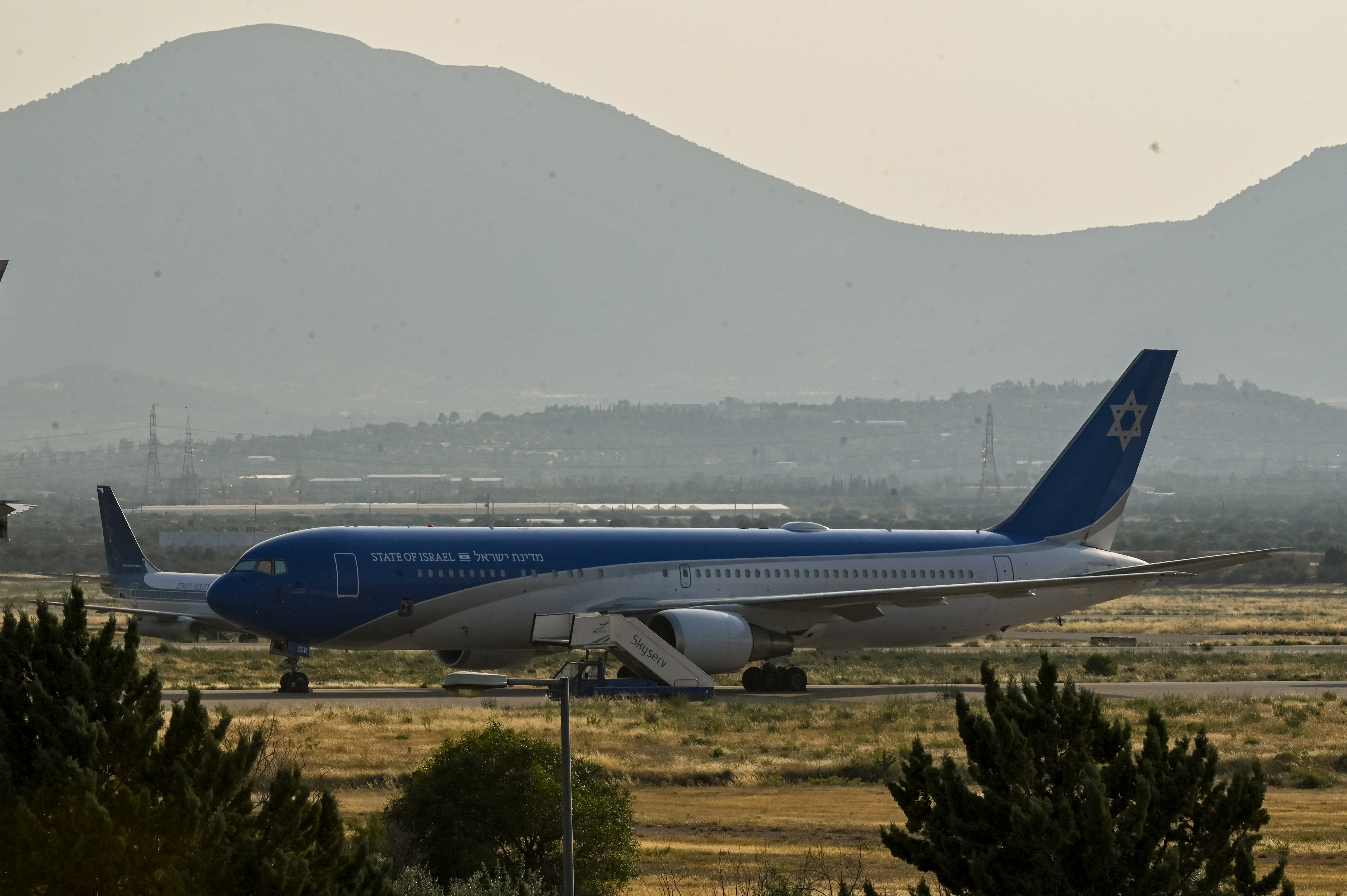 ATHENS, GREECE - JUNE 13: Israeli state aircraft Wing of Zion which flew to Greece from Ben Gurion airport, is seen at International Airport in Athens on June 13, 2025 in Athens, Greece. The Israeli government aircraft has been relocated to the Athens Flight Information Region due to the suspension of commercial flights in Israel. Last night, Israel attacked Iran with 200 jets, killing top military officials and nuclear scientists. Iran has responded by sending 100 drones to counterattack and says Israeli attacks are a declaration of war. (Photo by Milos Bicanski/Getty Images)