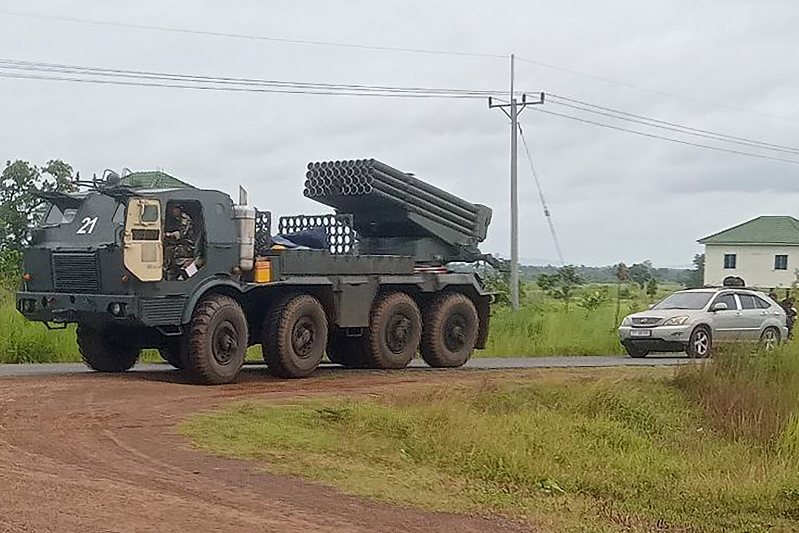 TOPSHOT - A Cambodian BM-21 multiple rocket launcher returns from the Cambodia-Thai border as Cambodian and Thai troops exchanged fire in a new round of clashes in Preah Vihear province on July 24, 2025. Thailand's army said three civilians were wounded in a Cambodian rocket strike on July 24 as the two countries' militaries clashed again in an escalating row over a disputed border. The neighbours are locked in a bitter spat over an area known as the Emerald Triangle, where the borders of both countries and Laos meet, and which is home to several ancient temples. (Photo by AFP) (Photo by STR/AFP via Getty Images)