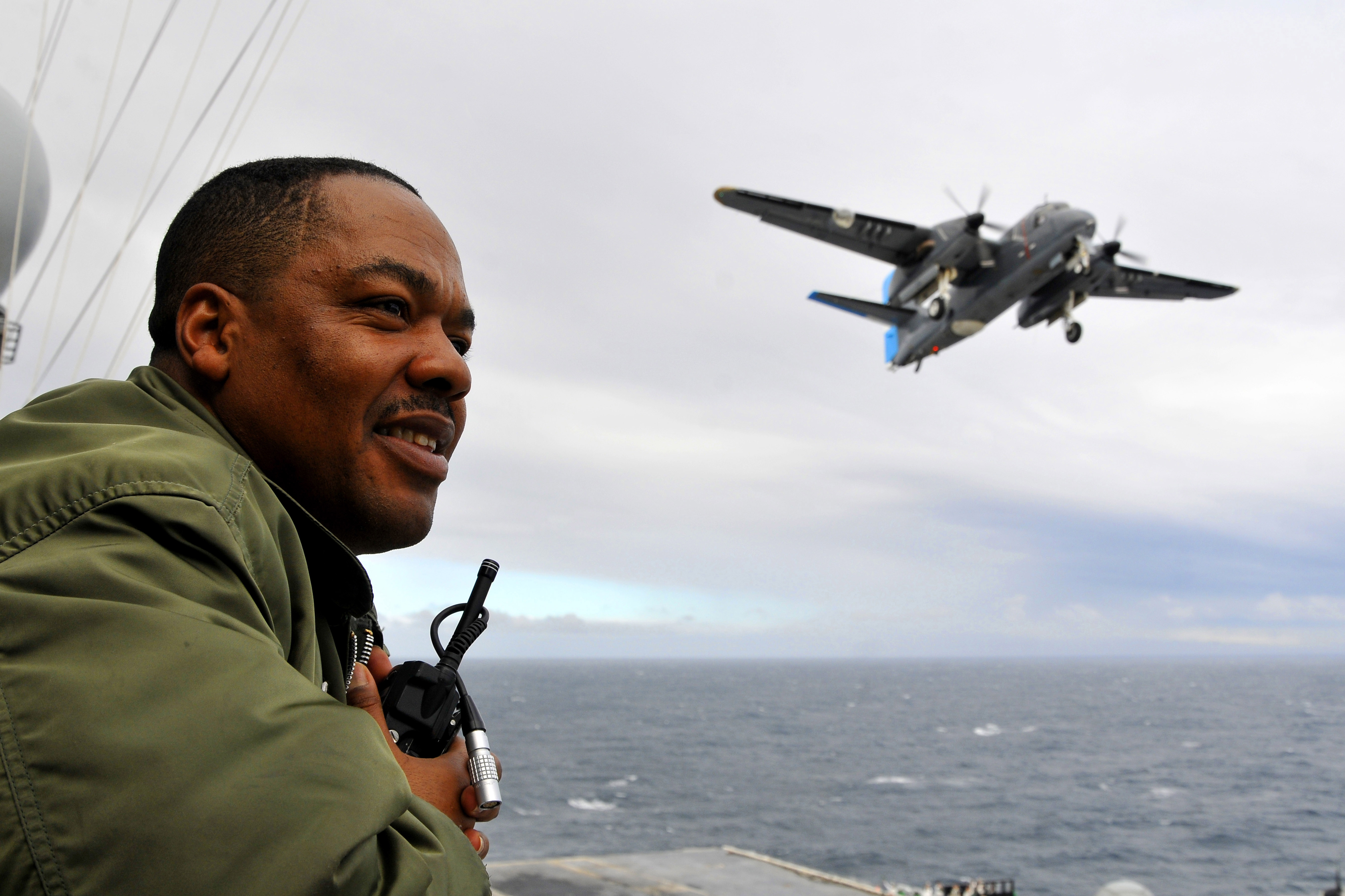 100310-N-0347B-257 ATLANTIC OCEAN - On board USS Carl Vinson (CVN 70), Chief Warrant Officer 3 Harold McLean watches an Argentinean S-2 Tracker perform a low approach exercise. The ship is underway off the coast of Argentina in support of Southern Seas 2010, a major component of Commander, U.S. Naval Forces Southern Command (COMUSNAVSO) Partnership of the Americas maritime engagement strategy and theater security cooperation activities to enhance regional stability and strengthen relationships among regional partners. (U.S. Navy photo by Mass Communication Specialist Seaman Apprentice Joshua Boyer/ Released)