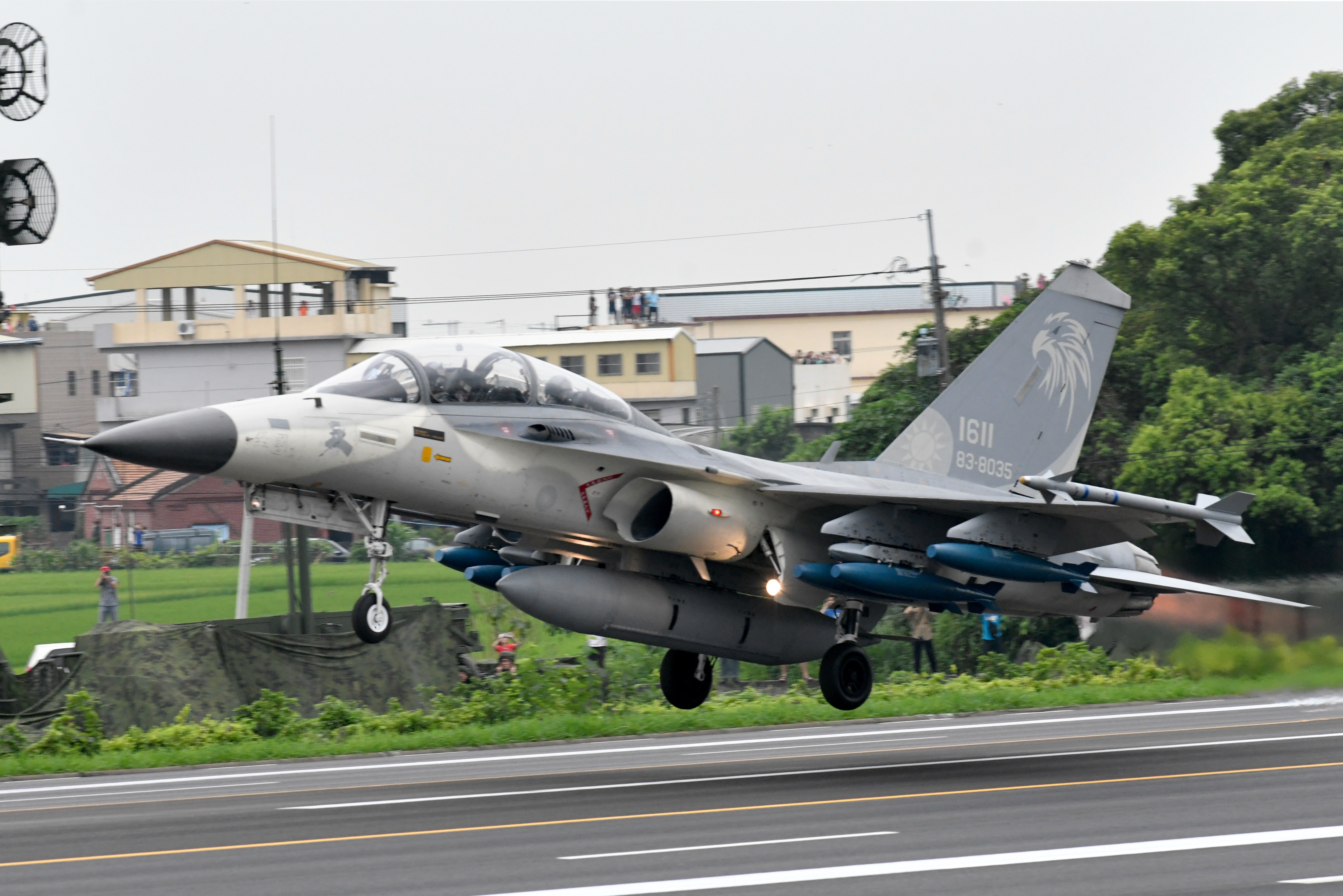 An home-made Indigenous Defense Fighter jet (IDF) takes off from the freeway in Changhua county, central Taiwan, during the 35th Han Kuang military drill on May 28, 2019. (Photo by Sam YEH / AFP) (Photo credit should read SAM YEH/AFP via Getty Images)