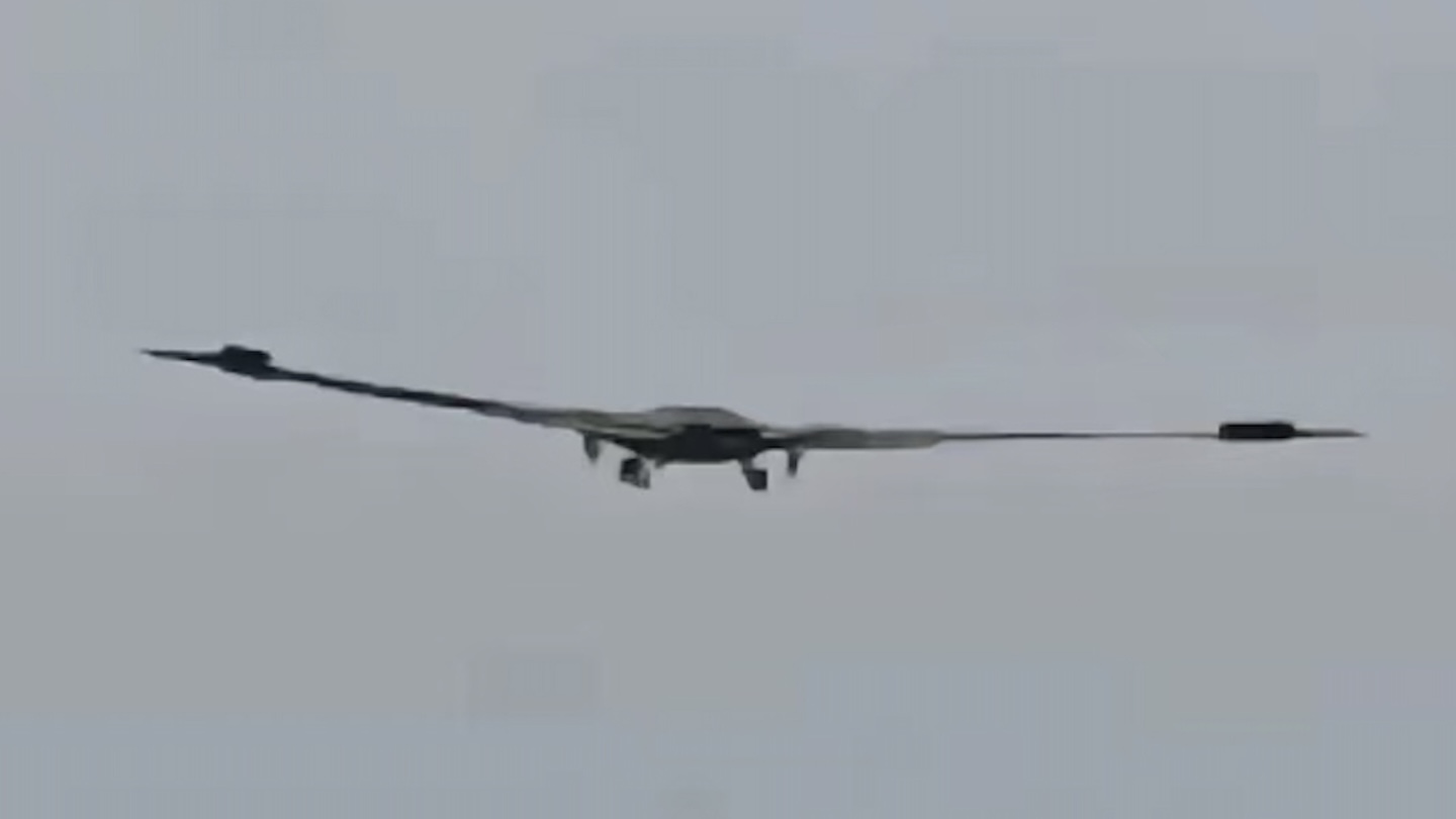 A recently emerged image shows a very large, low-observable, flying-wing aircraft flying in China. While the identity of the aircraft cannot be definitively established, it matches, in many respects, the appearance of the huge drone that TWZ was first to identify in satellite imagery dating from earlier this summer, and which you can read more about here.