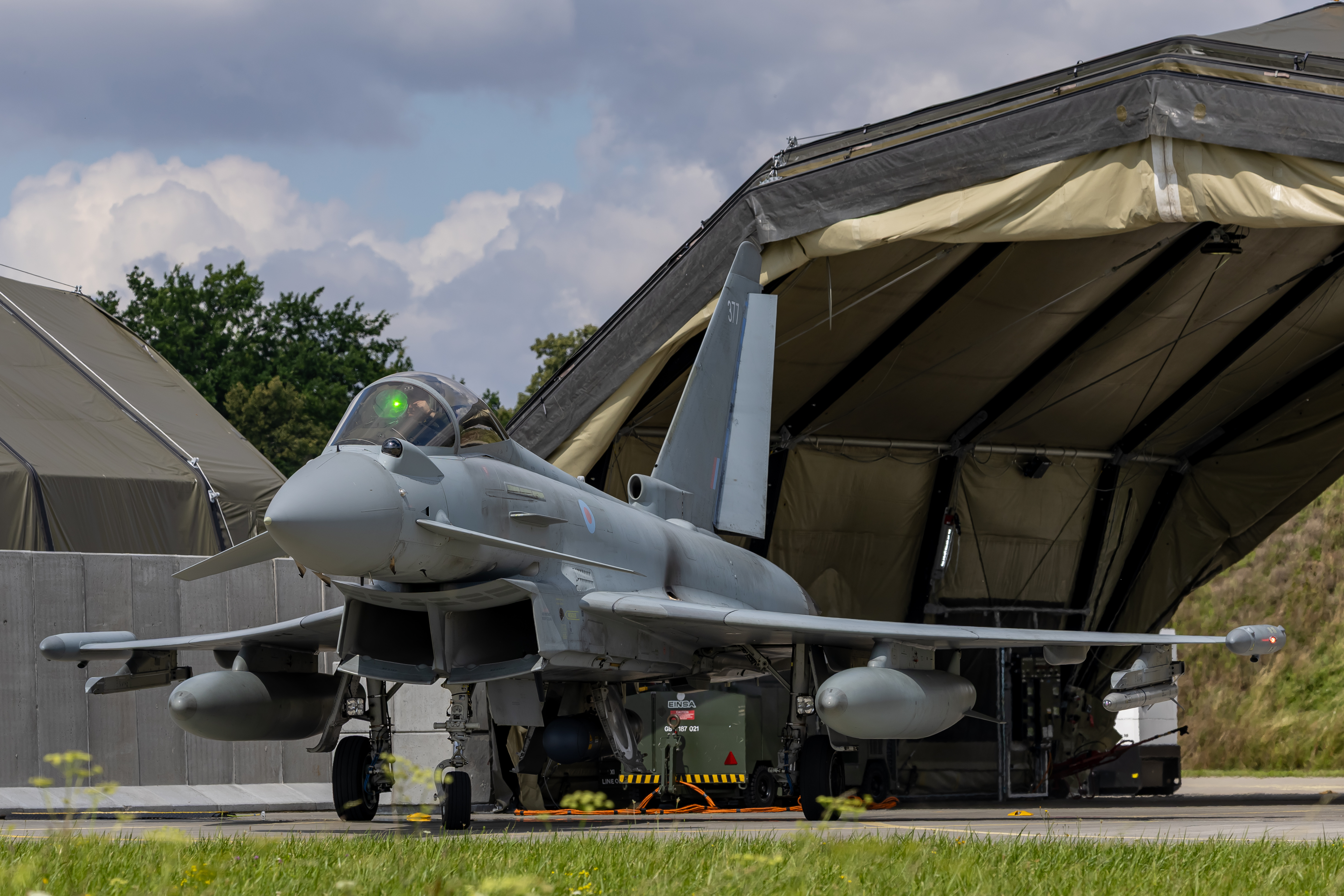 Image shows No. II (Army Co-operation) Squadron, FGR4 Typhoon, departing from Operation CHESSMAN to RAF Lossiemouth on the 1st of August 2025, 22 Tactical Air Base, Malbork, Poland. Operation CHESSMAN is the UK's contribution to NATO's Air Policing mission in 22 Tactical Air Base (TAB), Poland. It involves the RAF (Royal Air Force) and the Swedish Air Force working together to patrol and secure NATO airspace. The operation also includes personnel from the 140 Expeditionary Air Wing (EAW) and the 22nd Tactical Air Base in Poland.  Operation CHESSMAN involves personnel from various RAF units, including 140 EAW and II(AC) Squadron. RAF Typhoons are involved in intercepting Russian aircraft and demonstrating their capability to protect NATO airspace. 