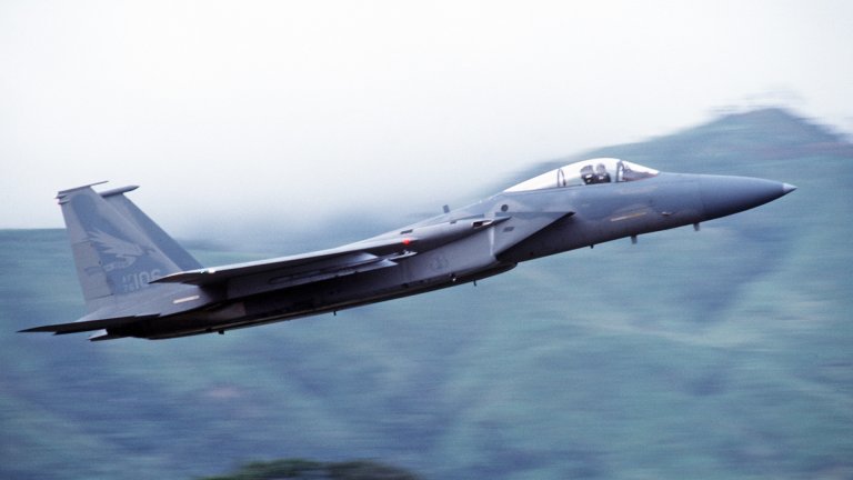 An air-to-air view of an F-15 Eagle sent to identify an aircraft which is possibly hauling drugs as detected by the Southern Regional Operations Center. The F-15 is part of Coronet Night Hawk, an all-guard mission using F-16s or F-15s on 24-hour alert status.
