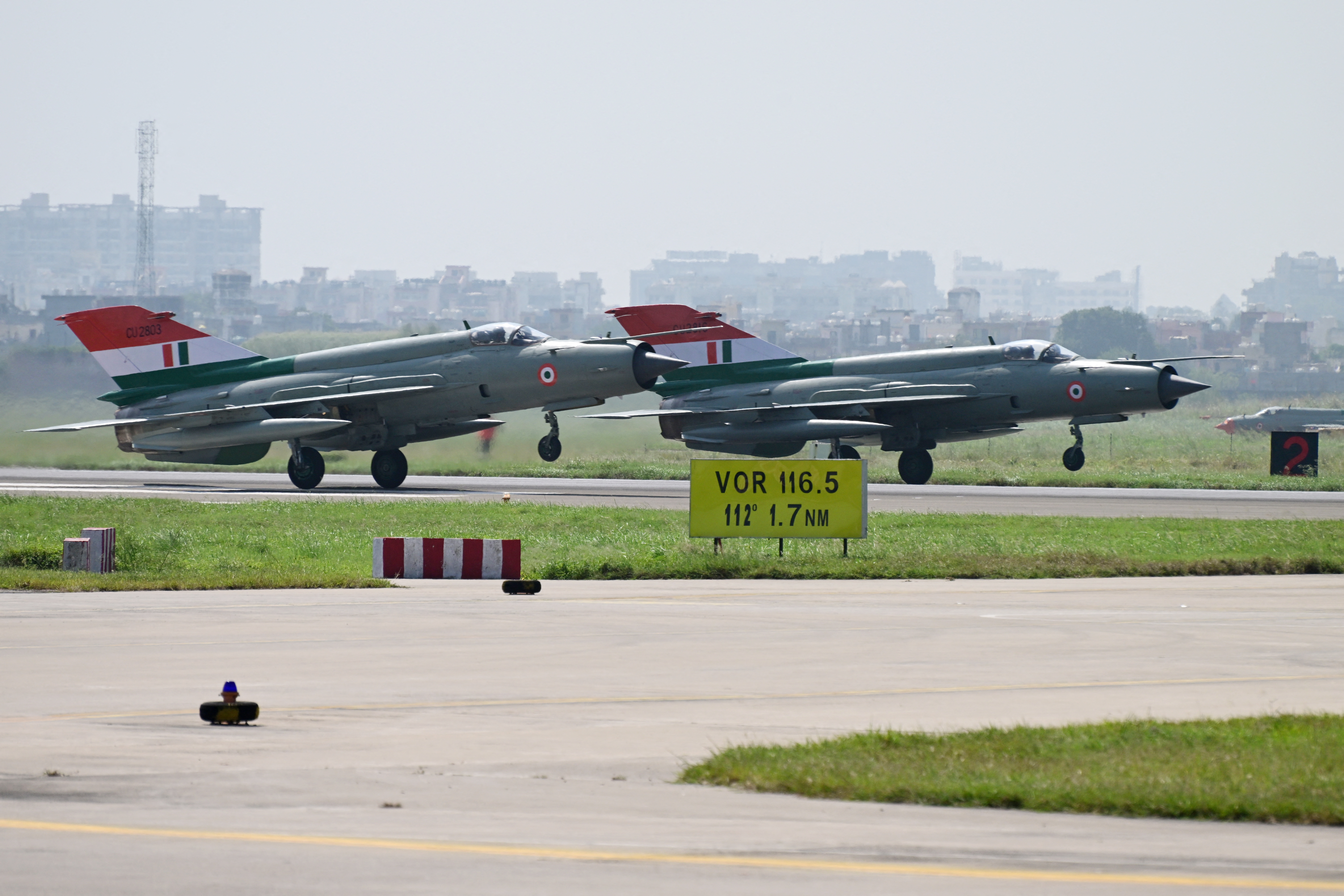 India's MiG-21 fighter jets prepare to take off for the last flypast during their farewell ceremony at the Chandigarh Air Force Station in Chandigarh on September 26, 2025. India's Russian-built MiG-21s flew for the final time on September 26, marking the end of an era for the country's first supersonic fighter jet -- lauded for its valour but tarnished by a legacy of some 400 crashes. (Photo by AFP) (Photo by -/AFP via Getty Images)