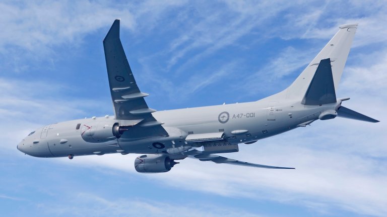 A RAAF P-8A Poseidon supports sea trials for the NUSHIP Hobart in the Gulf St Vincent off the coast of Adelaide.