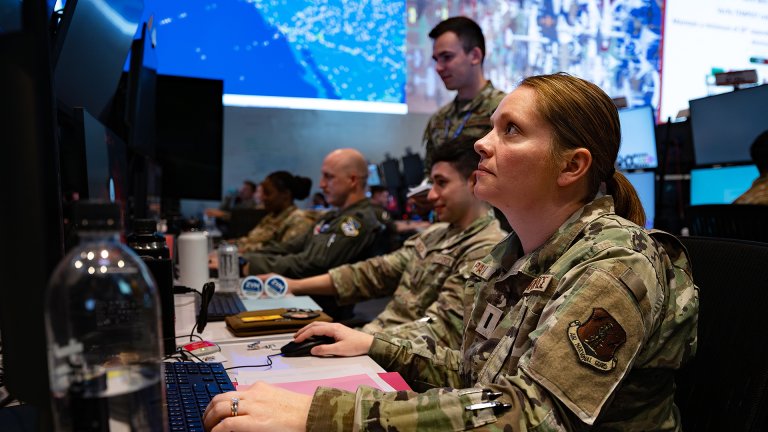 U.S. Air Force 1st Lt. Maurielle Pankau, a 183rd Air Component Operations Squadron intelligence analyst planner, participates in the Shadow Operations Center-Nellis Experiment 3 at Nellis Air Force Base, Nevada, June 13, 2025. Experiment participants were challenged to use human-machine teaming to deliver decision advantage in scenarios marked by complexity, speed, and uncertainty. (U.S. Air Force photo by Airman 1st Class Jennifer Nesbitt)