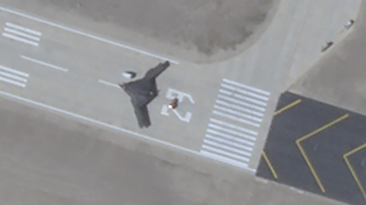 What looks to be a previously unseen low-observable flying-wing drone variant with a ‘cranked kite’ planform has emerged in a satellite image from China’s secretive test base near Malan in the country's far western Xinjiang province.
