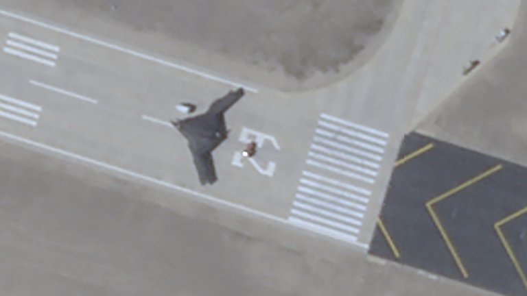 What looks to be a previously unseen low-observable flying-wing drone variant with a ‘cranked kite’ planform has emerged in a satellite image from China’s secretive test base near Malan in the country's far western Xinjiang province.