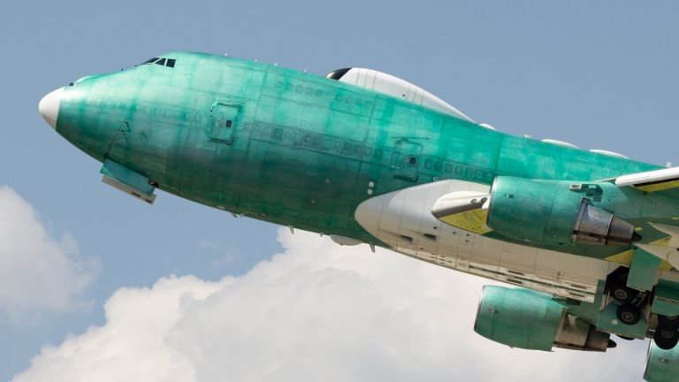 Plane spotters in Fort Worth, Texas, caught a glimpse of something rare yesterday, one of the U.S. Air Force's four E-4B Nightwatch jets flying completely stripped of paint and with much of its skin covered in a green zinc chromate coating.