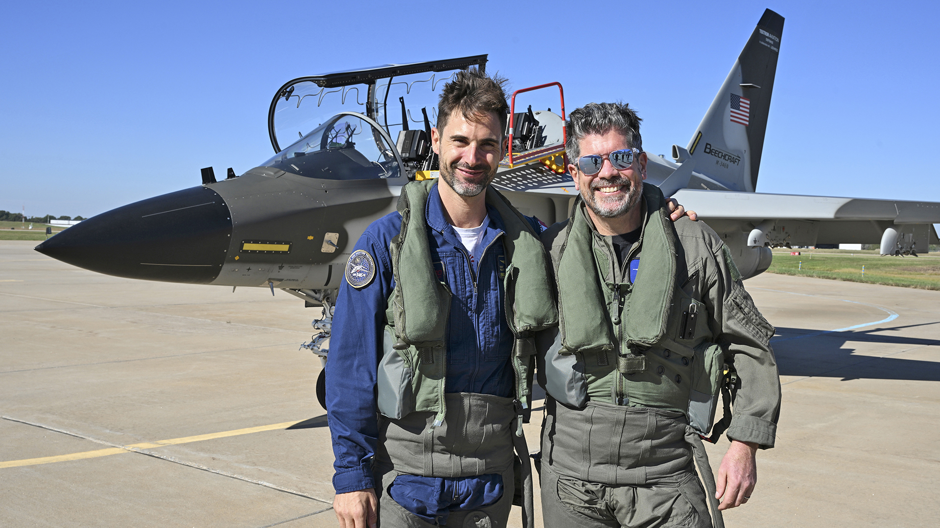Aviation Journalist Jamie Hunter flies in Beechcraft M-346N, CPX625, from Beech Factory Airport, Wichita, Kansas, on Oct. 16, 2025. Hunter had the opportunity to fly in the back seat of the aircraft to report on its attributes and capabilities for 'The War Zone' website. Leonardo Test Pilot Emiliano Battastelli, flew the jet. The M-346N in the U.S. as Textron Aviation Defense conducts a nationwide tour to showcase the aircraft to defense leadership. The M-346N is the proposed replacement for the T-45 Goshawk jet trainer for the U.S. Navy's Undergraduate Jet Training System and a product prepared for competition by Beechcraft in collaboration with Leonardo of Italy. (Textron Aviation Defense photo by Greg L. Davis)