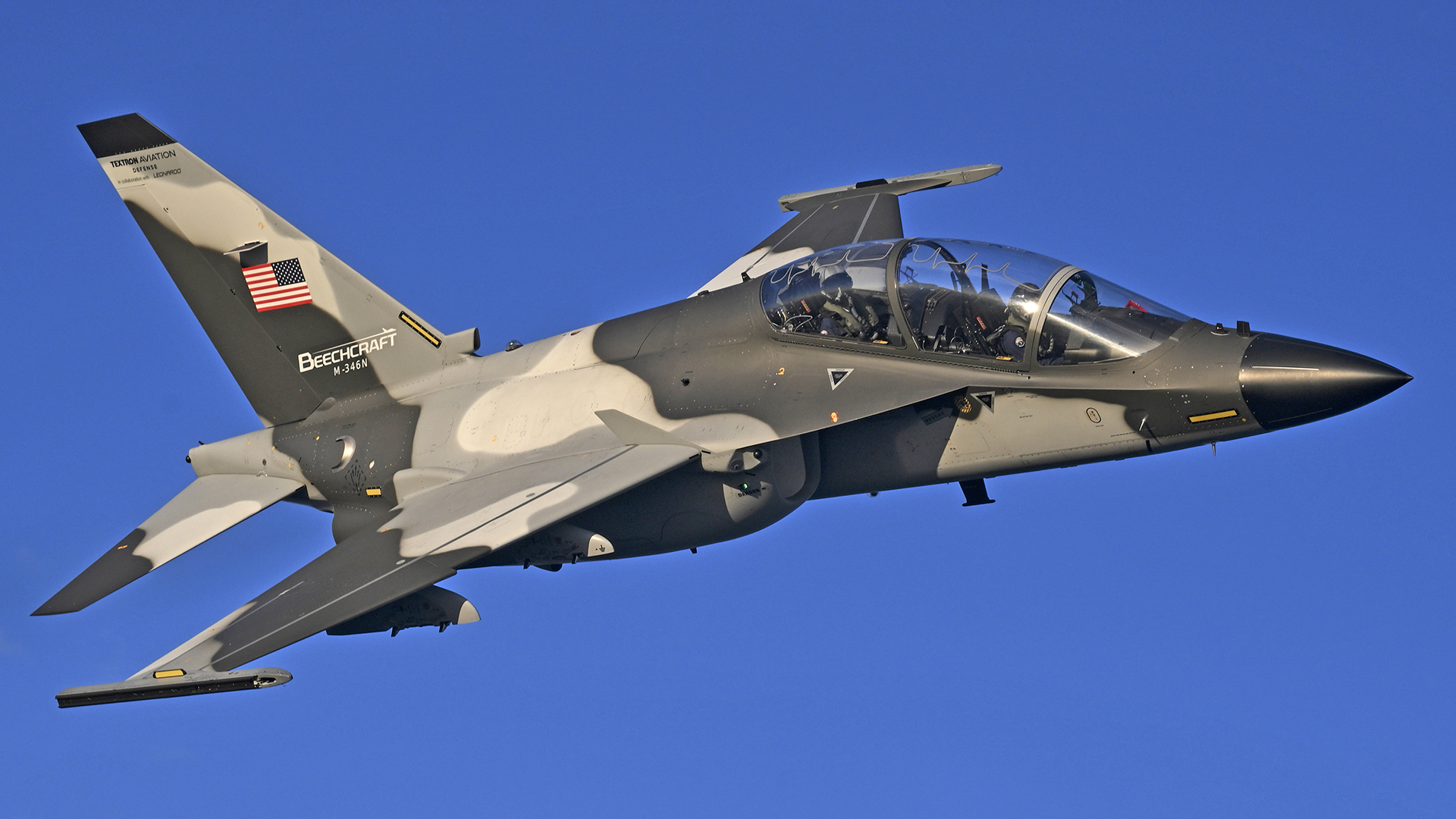 Beechcraft M-346N in-flight over Wichita, Kansas and surrounding area on Sept. 15, 2025. The aircraft is being flown by Leonardo test pilots Quirino Bucci, front seat, and Emiliano Battistelli, back seat, wtih chase from a Beechcraft AT-6E Wolverine flown by Textron Aviation Engineering/Defense Chief Pilot Stuart Rogerson. (Textron Aviation Defense / Greg L. Davis) The M-346N is the proposed replacement for the T-45 Goshawk jet trainer for the U.S. Navy's Undergraduate Jet Training System and a product prepared for competition by Beechcraft in collaboration with Leonardo of Italy.