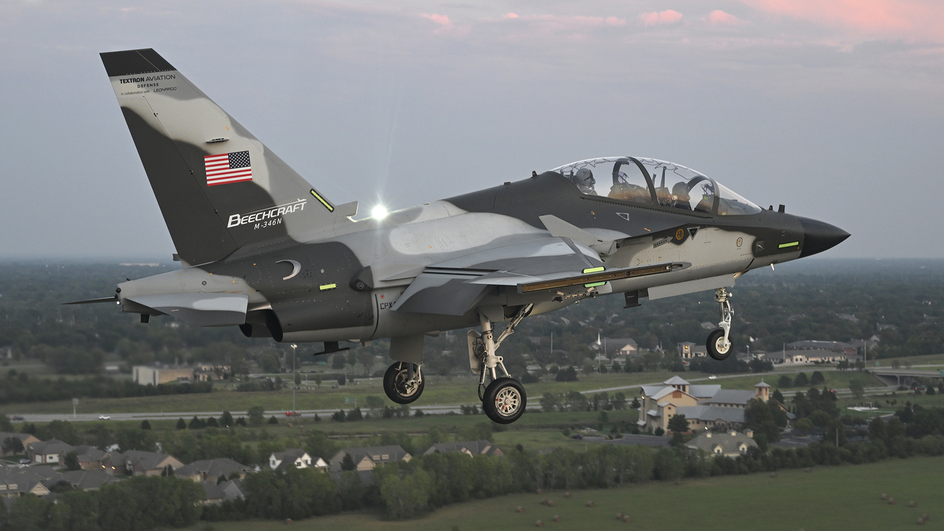 Beechcraft M-346N in-flight over Wichita, Kansas and surrounding area on Sept. 15, 2025. The aircraft is being flown by Leonardo test pilots Quirino Bucci, front seat, and Emiliano Battistelli, back seat, wtih chase from a Beechcraft AT-6E Wolverine flown by Textron Aviation Engineering/Defense Chief Pilot Stuart Rogerson. (Textron Aviation Defense / Greg L. Davis) The M-346N is the proposed replacement for the T-45 Goshawk jet trainer for the U.S. Navy's Undergraduate Jet Training System and a product prepared for competition by Beechcraft in collaboration with Leonardo of Italy.
