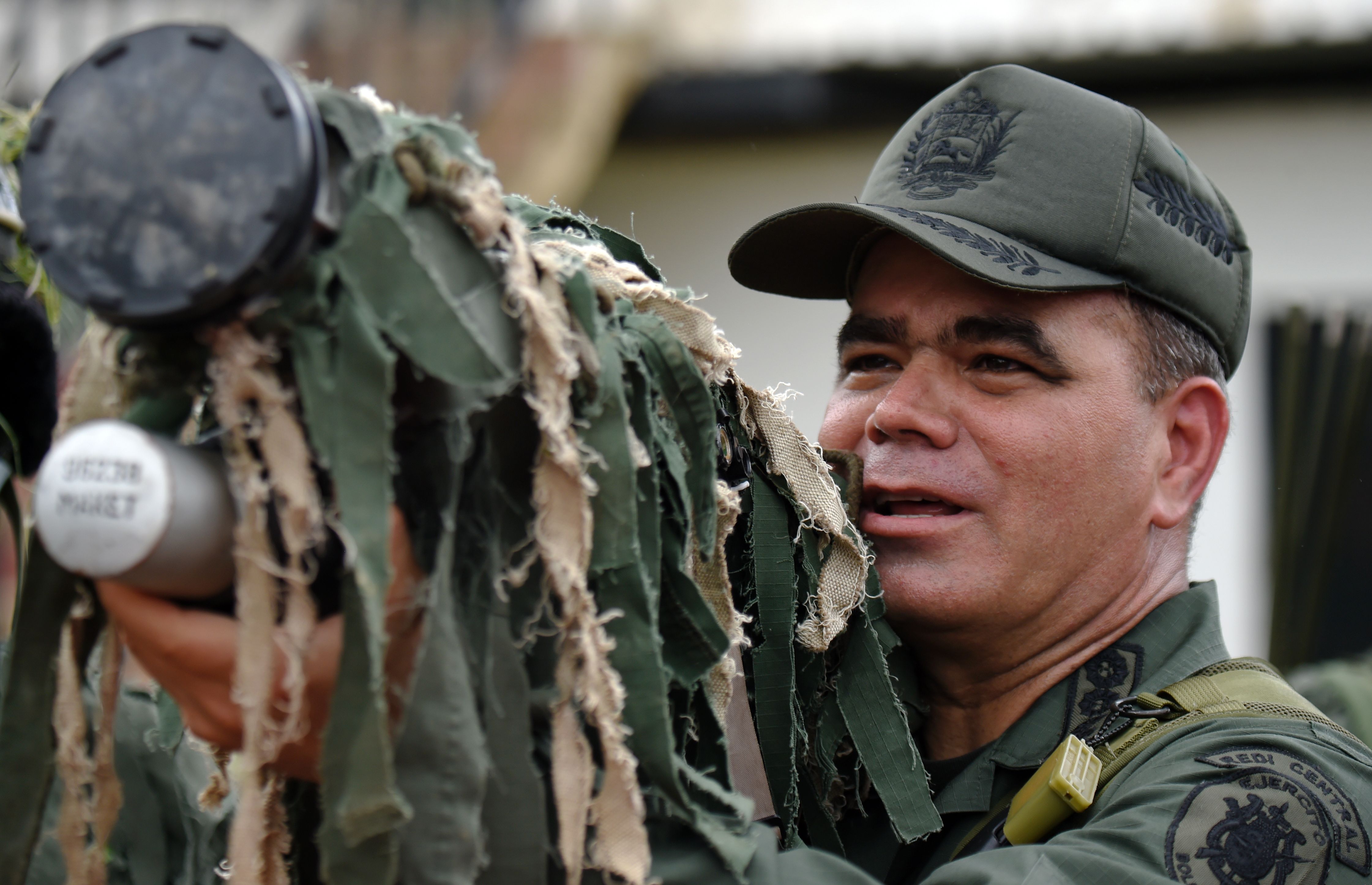 Venezuelan Defense Minister Padrino Lopez mans a Russian-made 9K338 "Igla-S" (SA-18) man-portable air-defence (MANPAD) surface-to-air missile launcher during a military training in Caracas on May 21, 2016. President Nicolas Maduro imposed a state of emergency earlier this week and ordered the two-day war games to show that the military can tackle domestic and foreign threats he says are being fomented with US help. / AFP / JUAN BARRETO (Photo credit should read JUAN BARRETO/AFP via Getty Images)