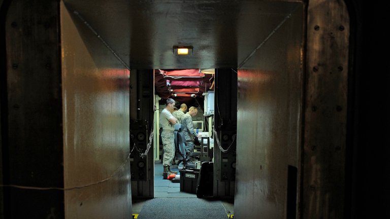 Members of the 576th Flight Test Squadron install launch control panels Feb. 26, 2015, during the start-up of the Missile Alert Facility for Glory Trip-214 and Glory Trip-215 at Vandenberg Air Force Base, Calif. The launch control panels are a vital safeguard for launching the Minuteman III missile in both test and field environments. For the operational test launches, unarmed Minuteman III missiles are used, with specialized data monitoring and test equipment.