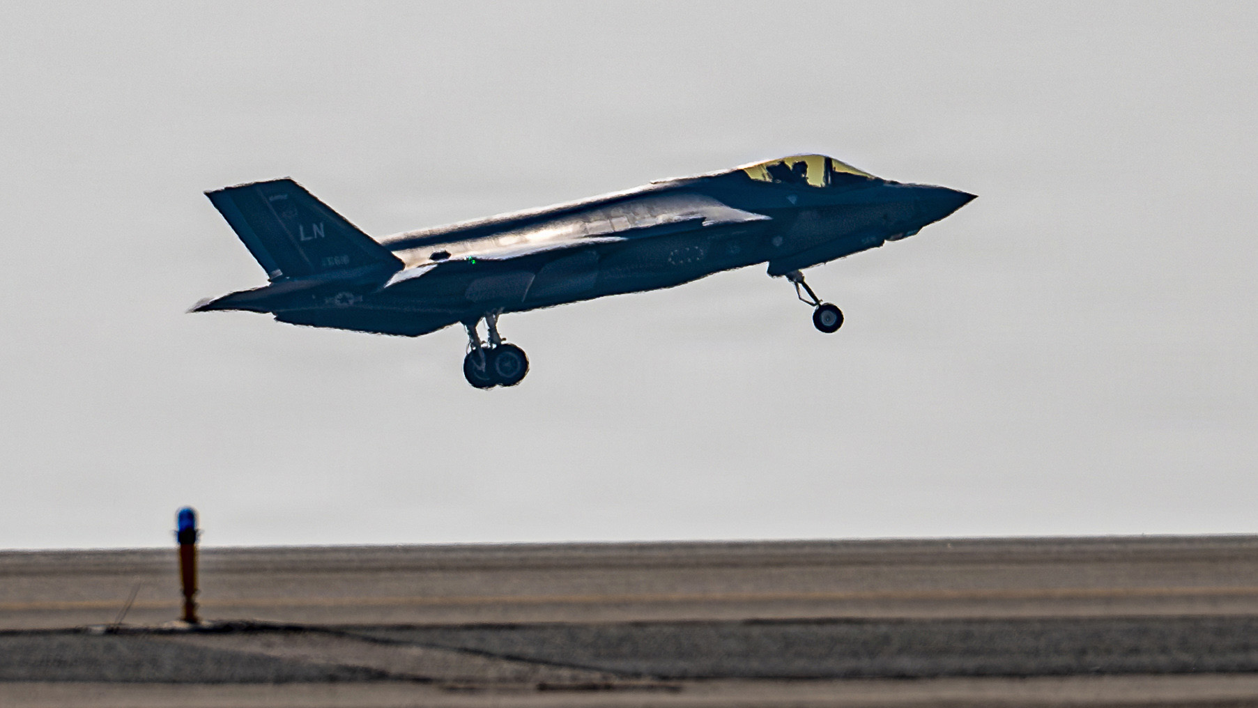 U.S. Air Force Maj. Melanie "Mach" Kluesner, pilot for the F-35A Lightning II Demonstration Team, takes off from Al Dhafra Air Base, United Arab Emirates, on Nov. 20, 2025. The team performs around the world to showcase the capabilities of the United States’ most advanced fifth-generation fighter. (U.S. Air Force photo by Staff Sgt. Nicholas Rupiper)