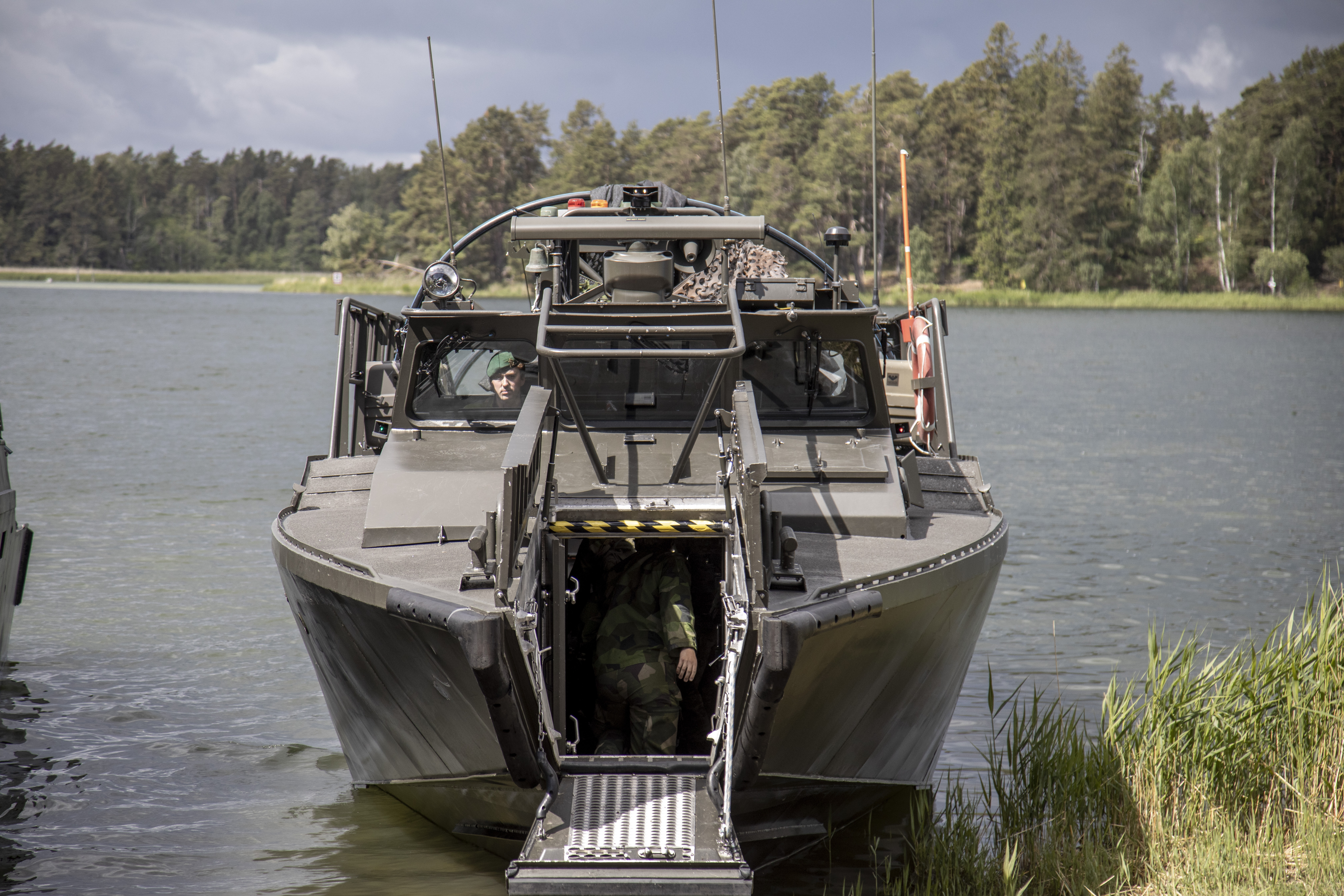 UTO, STOCKHOLM COUNTY, SWEDEN - JUNE 11: Servicemen belonging to the Stockholm's Amphibious Regiment are seen during the Baltops 24 military exercises on the island of Uto, located in the archipelago of Stockholm, Sweden on June 11, 2024. Baltops is the largest regional joint of navy and defense branches of armies carrying out integrated military operations within NATO framework in the Baltic Sea region, including Sweden and Finland as the new members of the alliance. (Photo by Narciso Contreras/Anadolu via Getty Images)