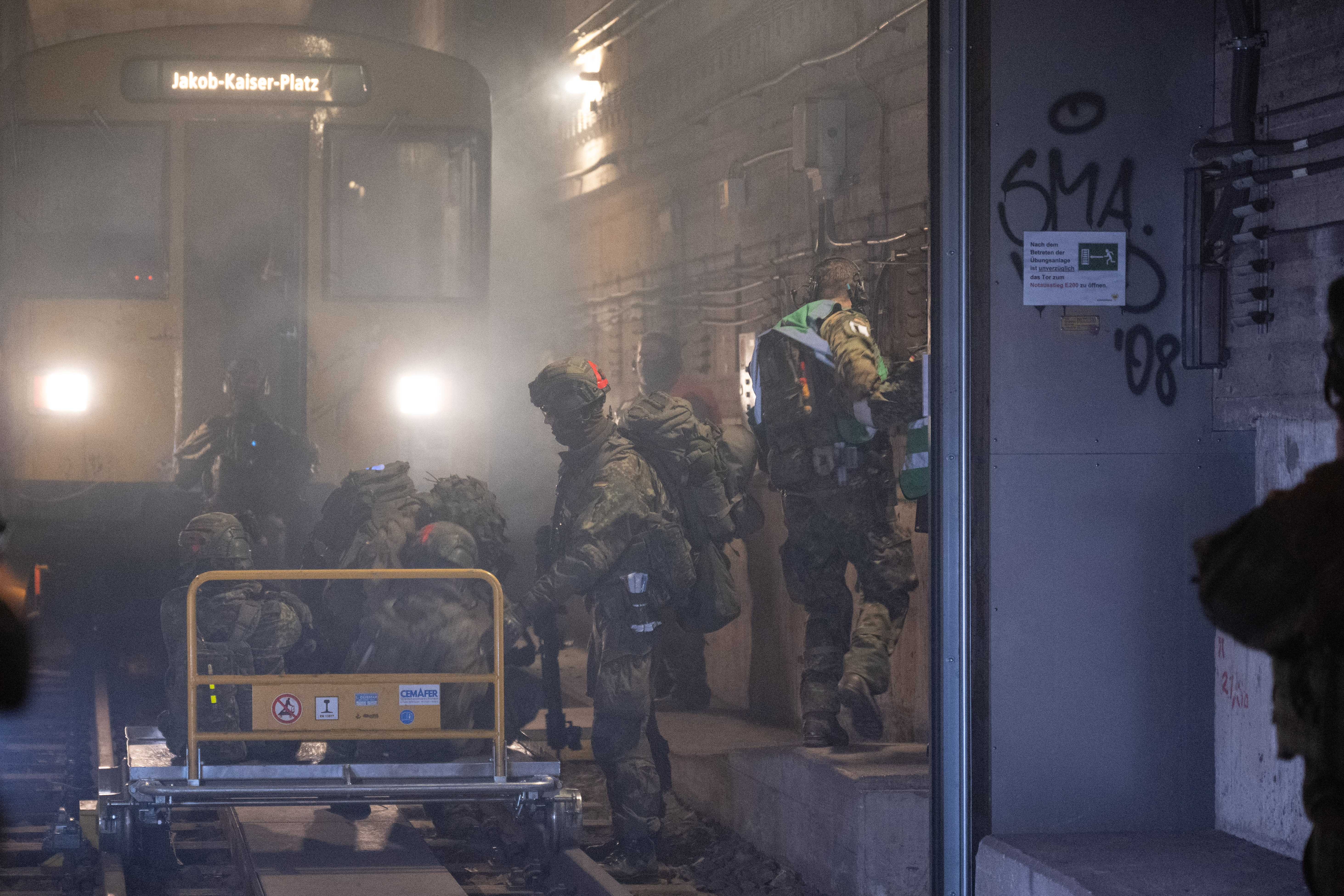 19 November 2025, Berlin: During the Bundeswehr exercise "Operation Bollwerk Bärlin", Bundeswehr soldiers representing injured soldiers are placed on a trolley in a subway tunnel at Jungfernheide subway station. The training scenario takes place in the training tunnel at Jungfernheide subway station and depicts an attack on a subway train with many casualties in the middle of the night. Photo: Christophe Gateau/dpa (Photo by Christophe Gateau/picture alliance via Getty Images)