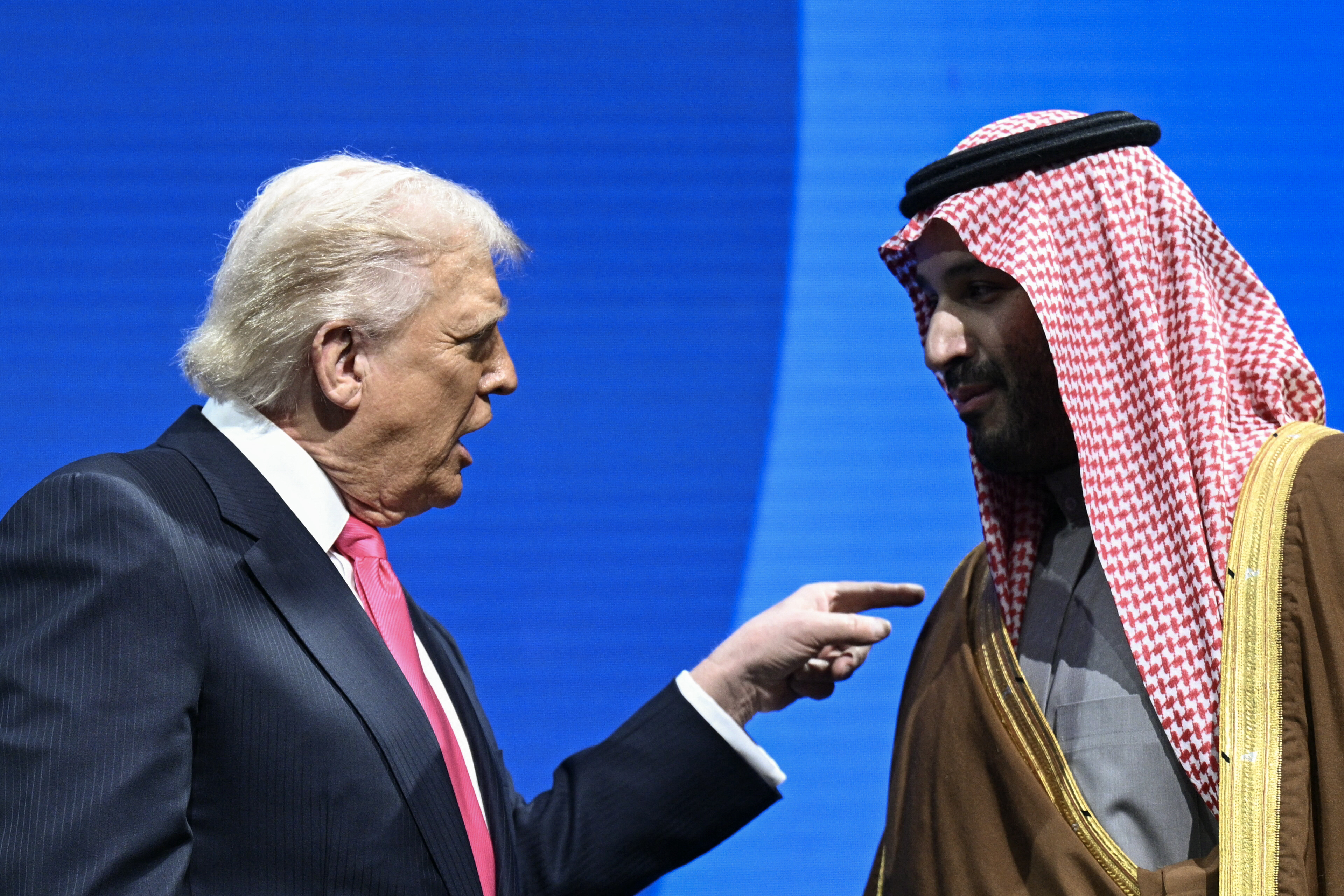 Crown Prince and Prime Minister of the Kingdom of Saudi Arabia Mohammed bin Salman and US President Donald Trump speaks at the US-Saudi Investment Forum at the John F. Kennedy Center for the Performing Arts in Washington, DC on November 19, 2025. (Photo by Brendan SMIALOWSKI / AFP) (Photo by BRENDAN SMIALOWSKI/AFP via Getty Images)