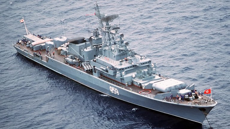 An aerial starboard bow view of the Soviet Krivak I Class guided missile frigate 959 at anchor.