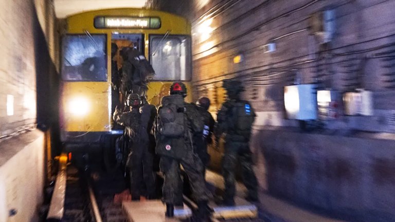 German soldiers board a subway train during subterranean training in Berlin.