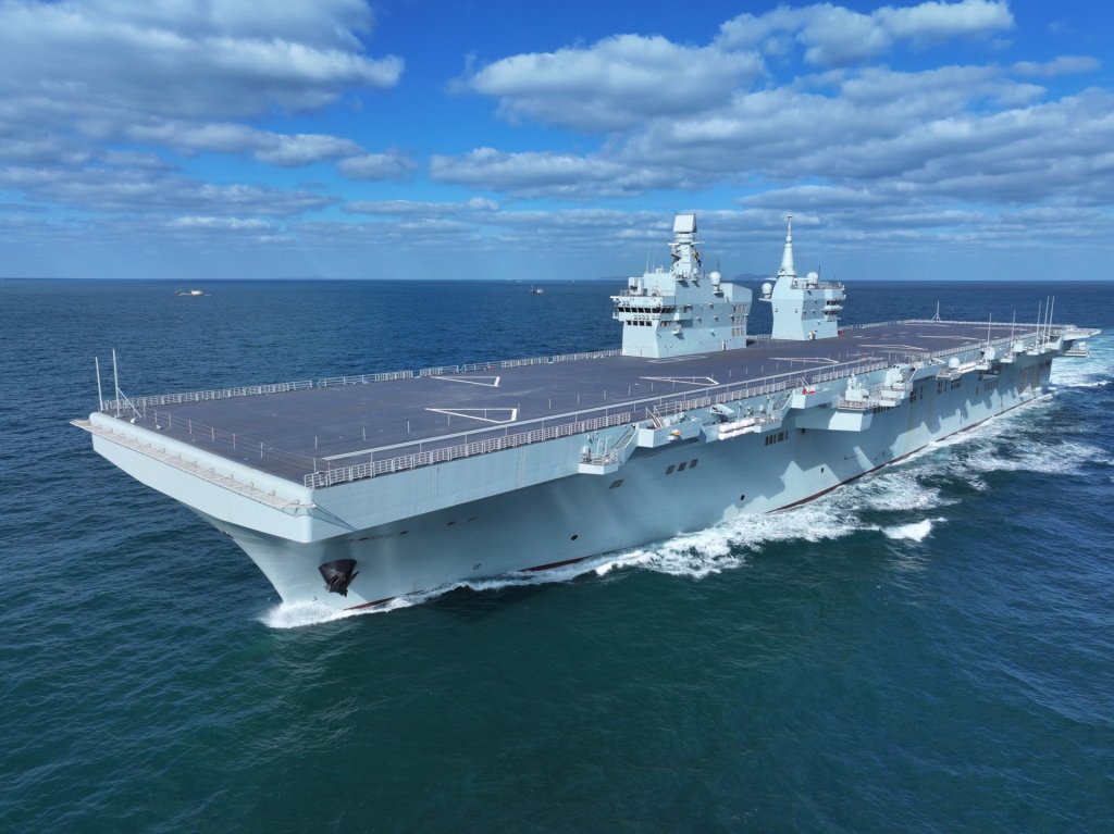A stock picture of the Type 076 amphibious assault ship Sichuan . PLA