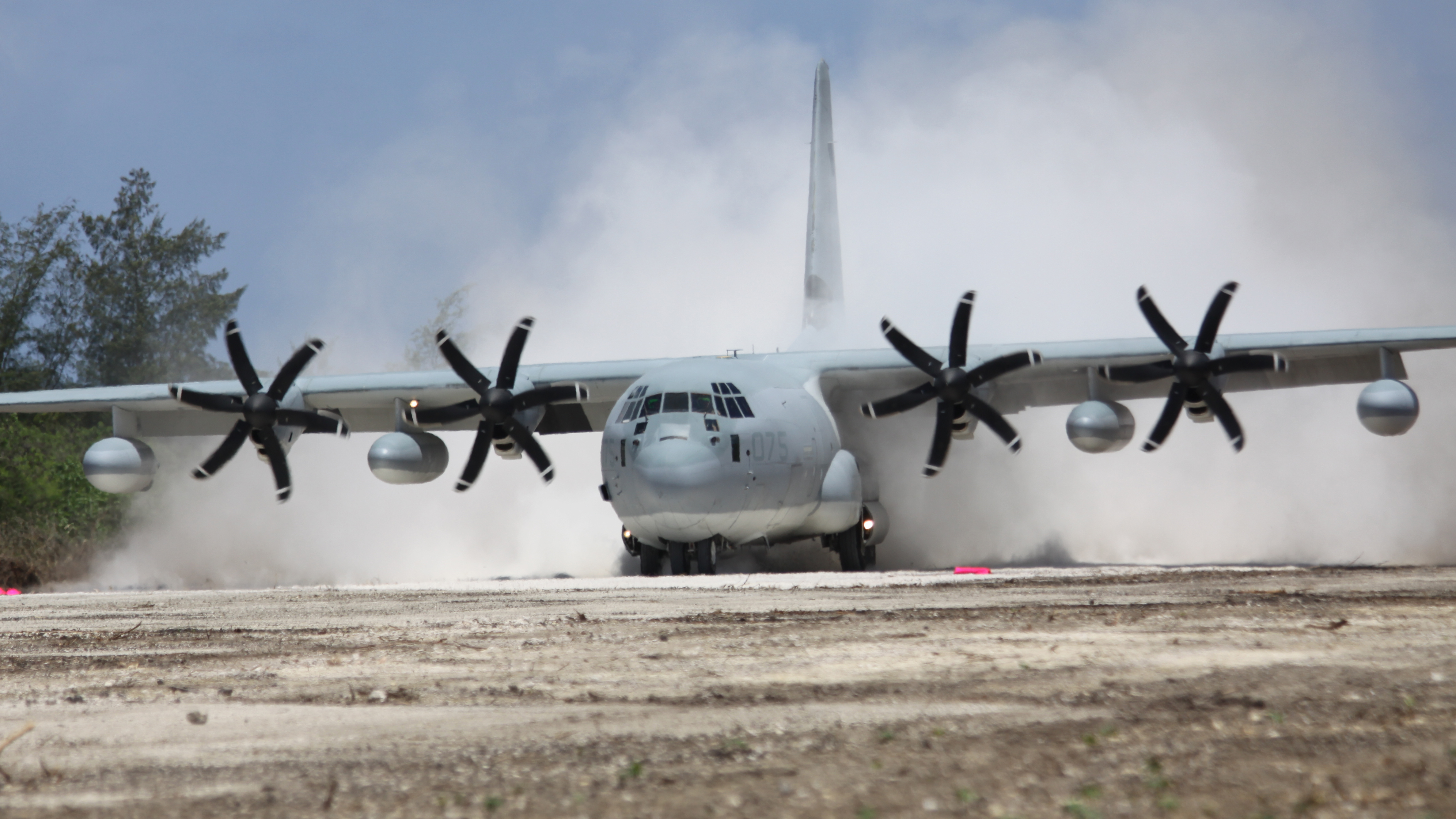 A KC-130J Hercules aircraft lands on Tinian Island's North Field runway, May 30, during Exercise Geiger Fury 2012. The aircraft was the first to land on the runway since 1947. The runway was cleared and repaired by elements of Marine Wing Support Squadron 171 during Exercise Geiger Fury 2012 which is intended to increase aviation readiness and simulate operations in a deployed austere environment. The aircraft is with Marine Aerial Refueler Transport Squadron 152, Marine Aircraft Group 36, 1st Marine Aircraft Wing, III Marine Expeditionary Force. MWSS-171 is with MAG-12, 1st MAW, III MEF.