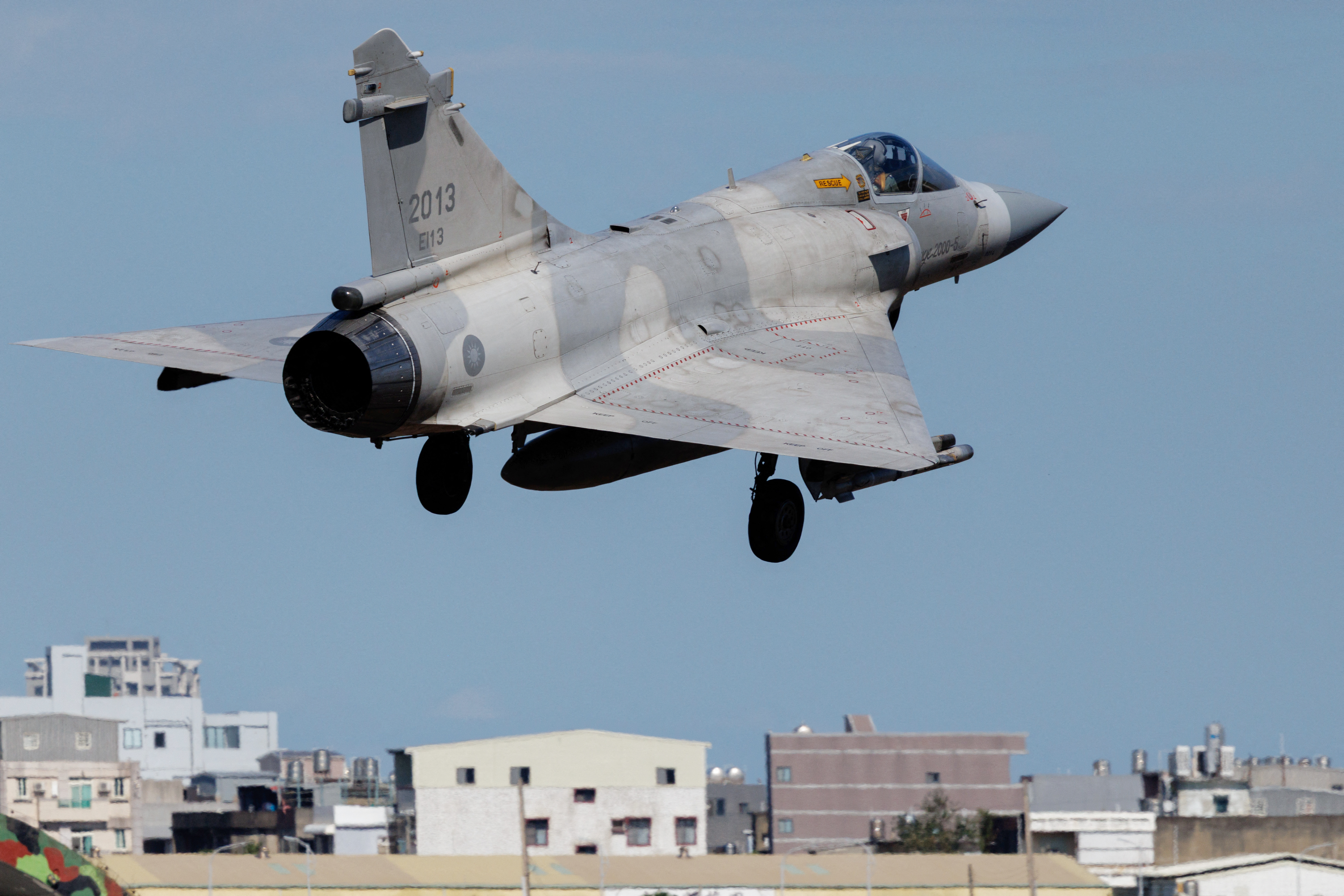 A Taiwanese air force Mirage 2000 fighter jet takes off at Hsinchu Air Base in Hsinchu on December 29, 2025. China launched "major" military exercises around Taiwan on December 29, in what it called a "stern warning" involving live-fire drills in waters and airspace near the island. Taiwan said Monday it had detected four Chinese coastguard ships near the island's waters. (Photo by CHENG Yu-chen / AFP via Getty Images)