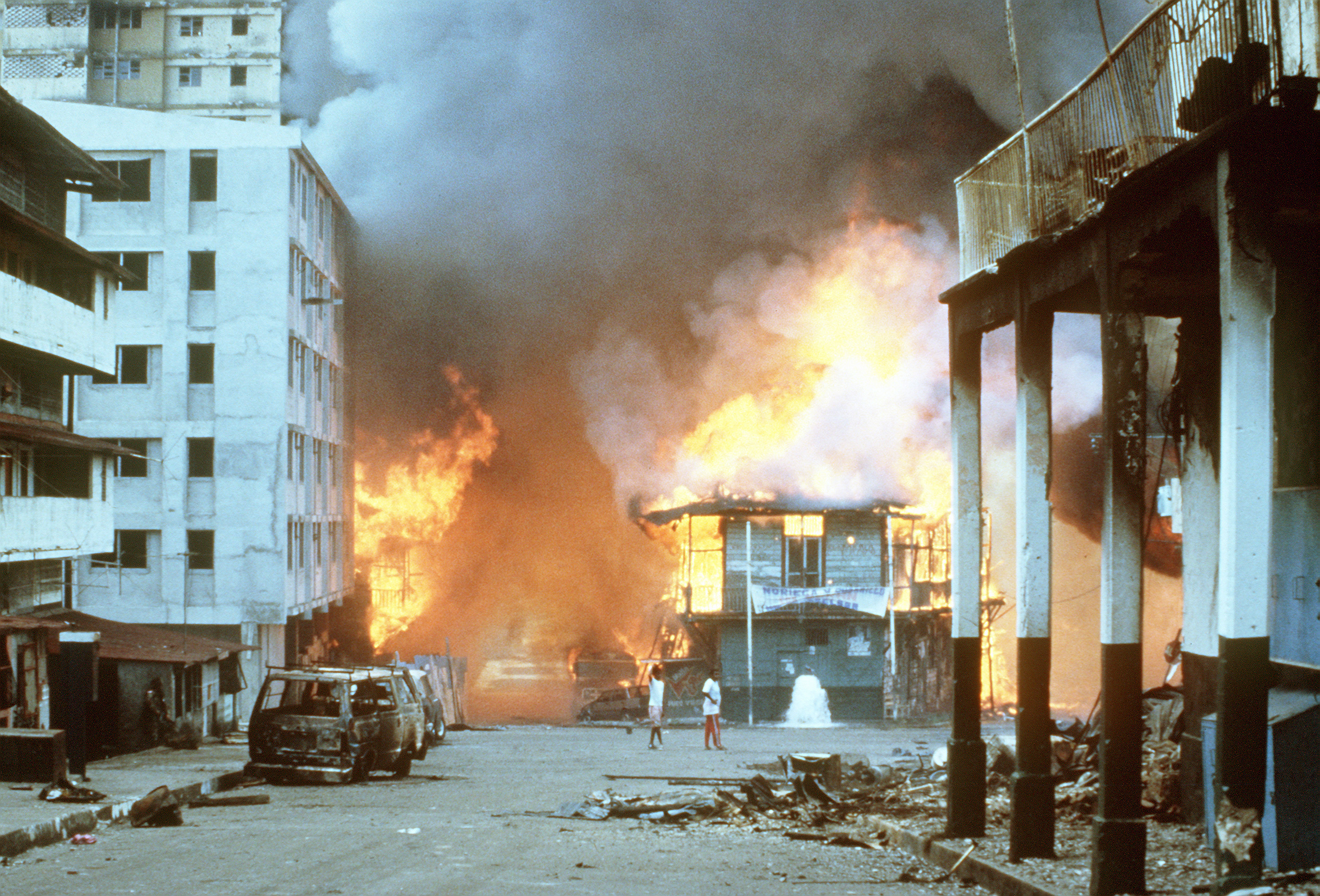 Flames engulf a building following the outbreak of hostilities between the Panamanian Defense Force and U.S. forces during Operation Just Cause.
