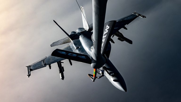 A U.S. Air Force KC-135 Stratotanker offloads fuel to a U.S. Navy F/A-18 Super Hornet, assigned to the Harry S. Truman Carrier Strike Group, over the U.S. Central Command area of responsibility, April 8, 2025. The KC-135 Stratotanker is the backbone of U.S. Air Forces Central's global reach aerial refueling capability and delivers critical support to joint and coalition aircraft in order to guarantee war-winning airpower throughout the CENTCOM AOR.