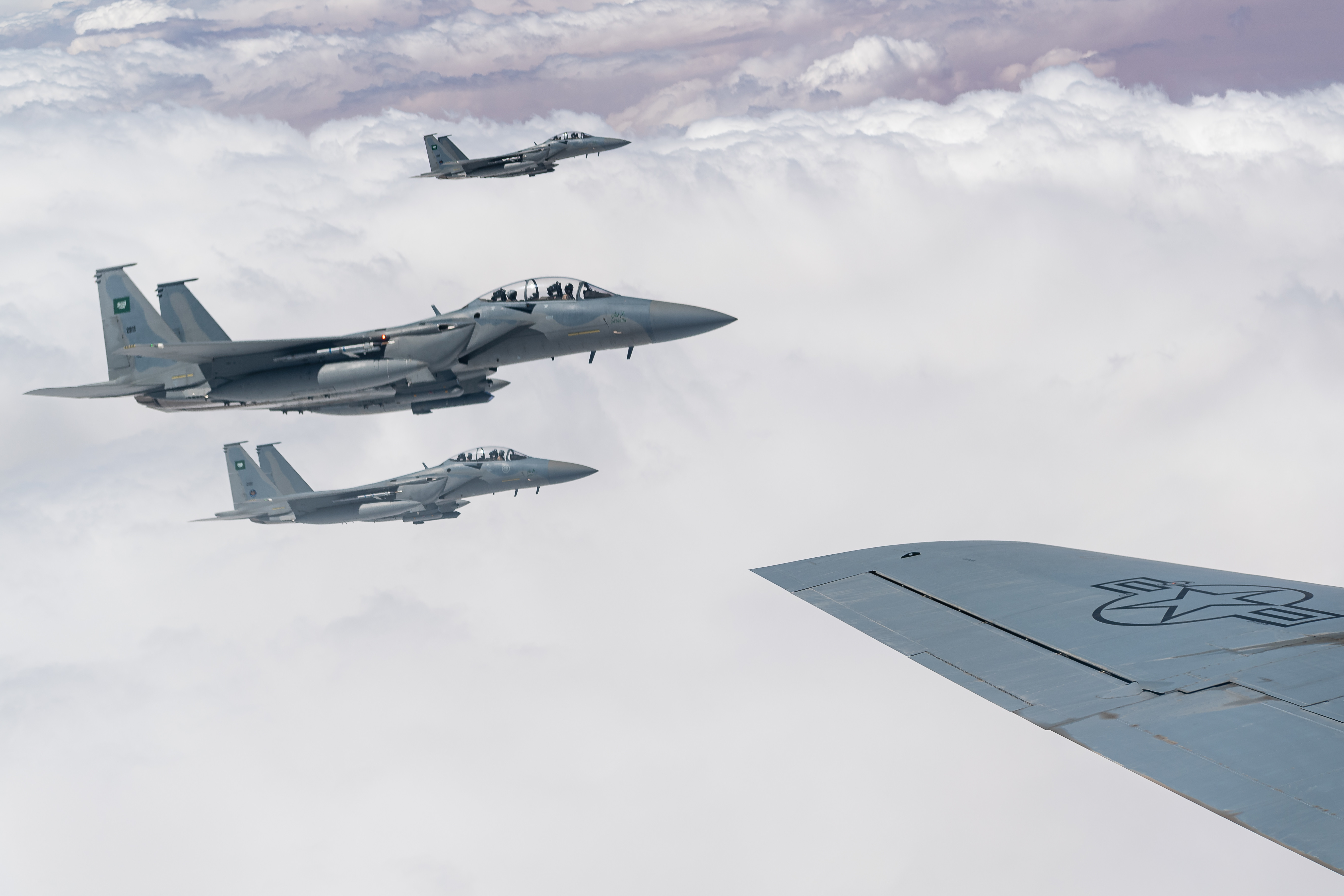 Four Royal Saudi Air Force F-15s fly in formation with U.S. Air Force F-15 Strike Eagles over the U.S. Central Command area of responsibility, Sept 10, 2020. AFCENT continues to build and strengthen our partners by training alongside one another, integrating capabilities and increasing interoperability, to project agile combat employment from established and austere locations throughout the U.S. Central Command area of responsibility. (U.S. Air Force photo by Staff Sgt. Justin Parsons)