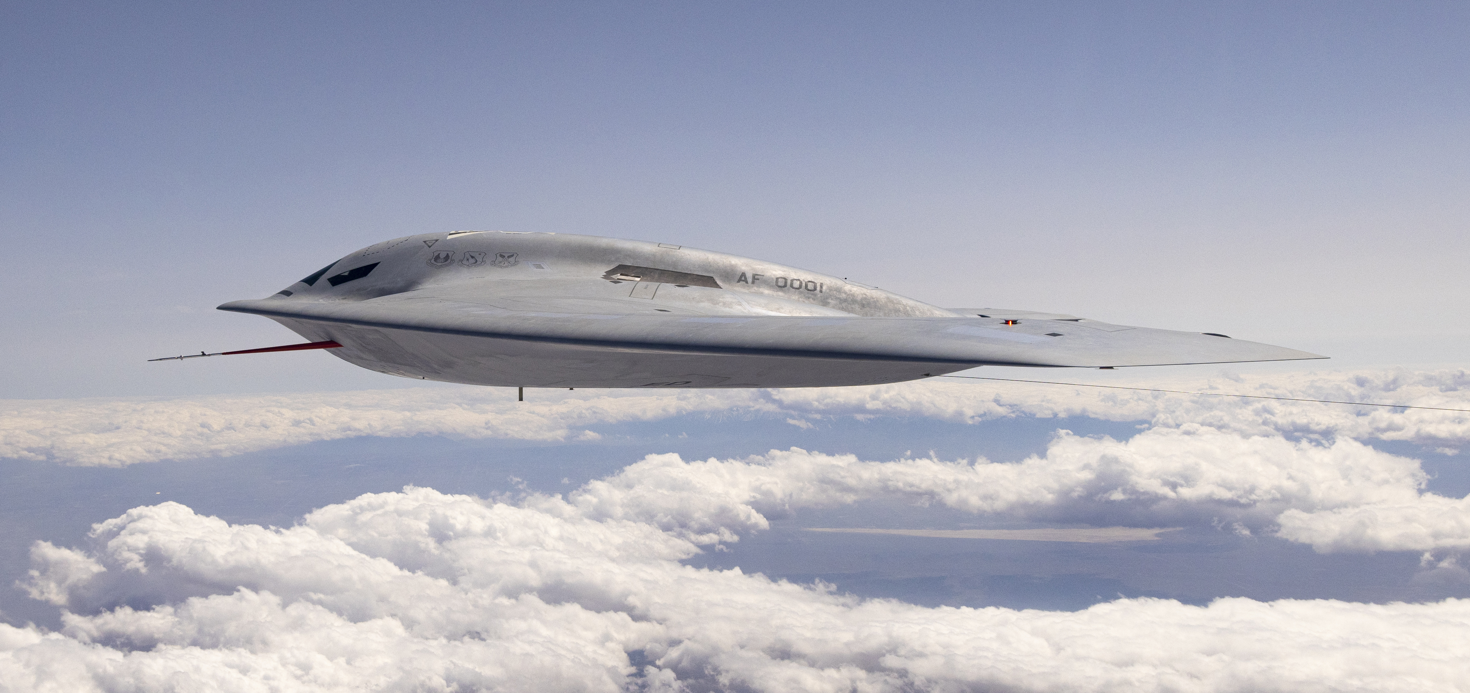 A B-21 Raider conducts flight testing, which includes ground testing, taxiing, and flying operations, at Edwards Air Force Base, California. The B-21 will interoperate with our allies and partners to deliver on our enduring commitment to provide flexible strike options for coalition operations that defend us against common threats. (Courtesy photo)