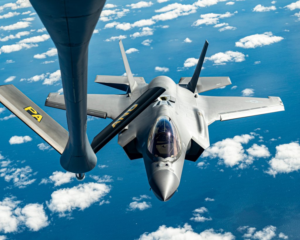A U.S. Air Force F-35 Lightning II aircraft assigned to the 158th Fighter Wing, Vermont Air National Guard, follows a KC-135 Stratotanker aircraft assigned to the 171st Air Refueling Wing, Pennsylvania Air National Guard, to perform a routine aerial refueling mission on Oct. 10, 2024, off the coast of Atlantic City, New Jersey. The KC-135 can deliver up to 4,800 pounds or 716 gallons of jet fuel per minute. (U.S. Air National Guard photo by Tech. Sgt. Zoe M. Wockenfuss)
