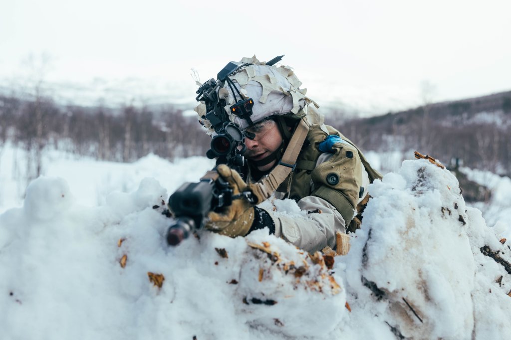A Norwegian Army Soldier participates in a squad attack demonstration to partner nations during the battle handover for Exercise Joint Viking 25 in Setermoen, Norway, March 8, 2025. U.S. Marines are in Norway as part of Exercise Joint Viking 25, a Norwegian military exercise focusing on arctic cold-weather training and military-to-military engagements. The exercise demonstrates the Marine Corps' unique ability to rapidly deploy during a crisis and aims to enhance interoperability between the U.S. Marine Corps and NATO allies and partners. (U.S. Marine Corps photo by Cpl. Alfonso Livrieri)