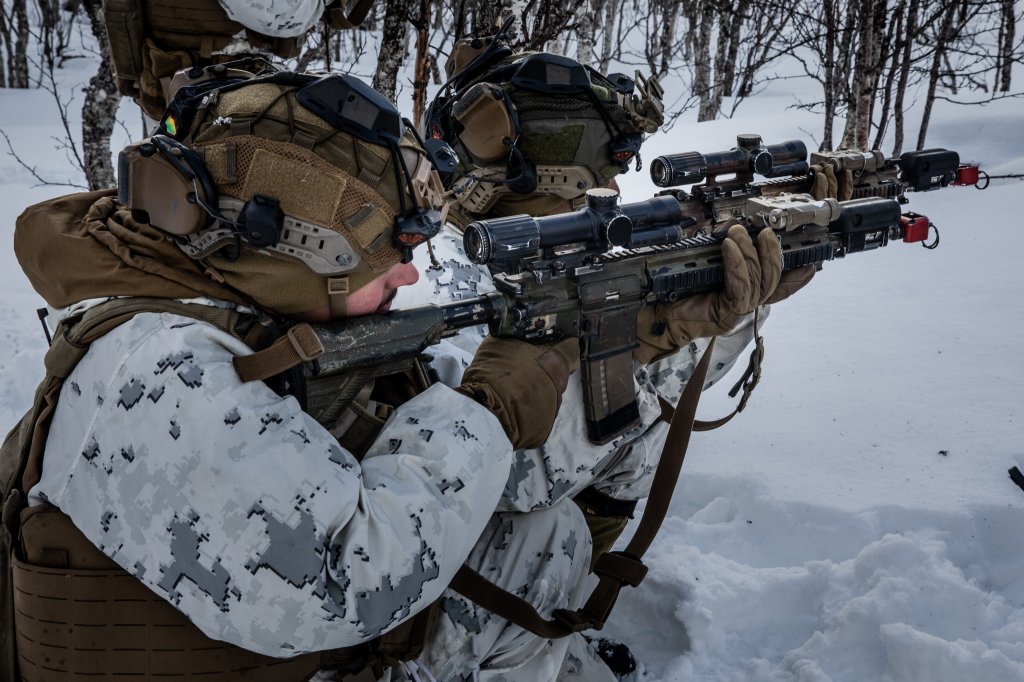U.S. Marines with 2d Battalion, 8th Marines, 2d Marine Division hold a defensive position during Exercise Joint Viking 25 in Norway, March 8, 2025. U.S. Marines are in Norway as part of exercise Joint Viking 25, a Norwegian military exercise focusing on arctic cold-weather training and military-to-military engagements. The exercise demonstrates the Marine Corps' unique ability to rapidly deploy during a crisis and aims to enhance interoperability between the U.S. Marine Corps and NATO allies and partners. (U.S. Marine Corps photo by Cpl. Alexander Peterson)