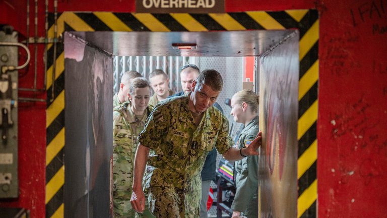 U.S. Navy Adm. Rich Correll, commander, U.S. Strategic Command, enters a launch control center at Malmstrom Air Force Base, Montana, Dec. 15, 2025. Correll took command of USSTRATCOM on Dec. 5, 2025, after serving as the deputy commander for three years. Malmstrom is the first missile base he has visited in his new position. (U.S. Air Force photo by Airman 1st Class Jack Rodriguez Escamilla)