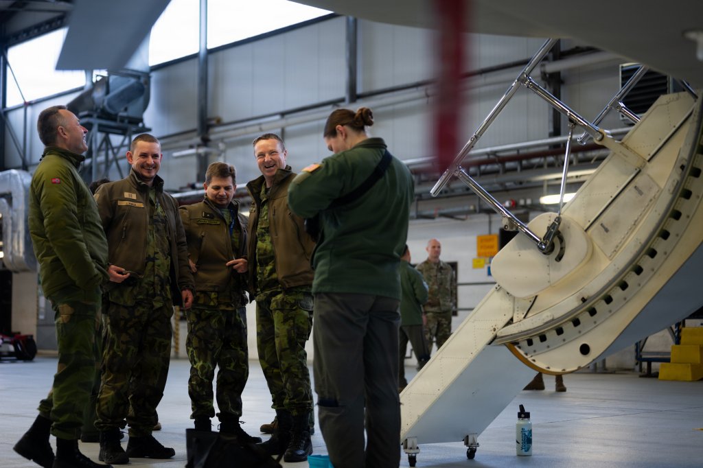 Royal Norwegian Air Force airmen receive a tour of a U.S. Air Force EA-37B Compass Call assigned to the 55th Electronic Combat Group, Davis-Monthan Air Force Base, Arizona, at Ramstein Air Base, Germany, Jan. 26, 2026. The EA-37B visited Ramstein as part of a road show to familiarize Airmen, units and NATO Allies in the U.S. Air Forces in Europe area of responsibility with the new platform and its capabilities. (U.S. Air Force photo by Senior Airman Edgar Grimaldo)