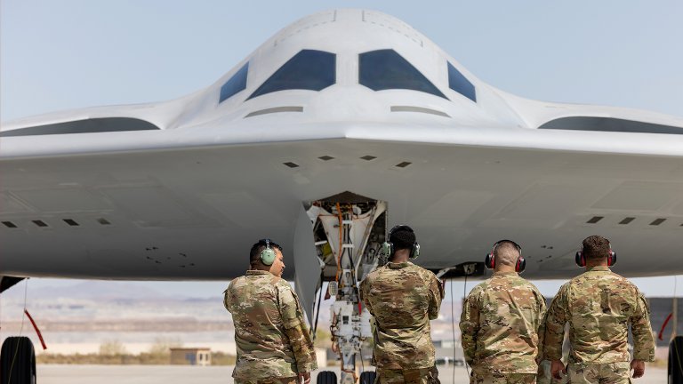 U.S. Air Force Airmen with the 912th Aircraft Maintenance Squadron prepare to recover the second B-21 Raider to arrive for test and evaluation at Edwards AFB, Calif., Sept. 11, 2025. The arrival of a second test aircraft provides maintainers valuable hands-on experience with tools, data and processes that will support future operational squadrons. (U.S Air Force photo by Kyle Brasier)