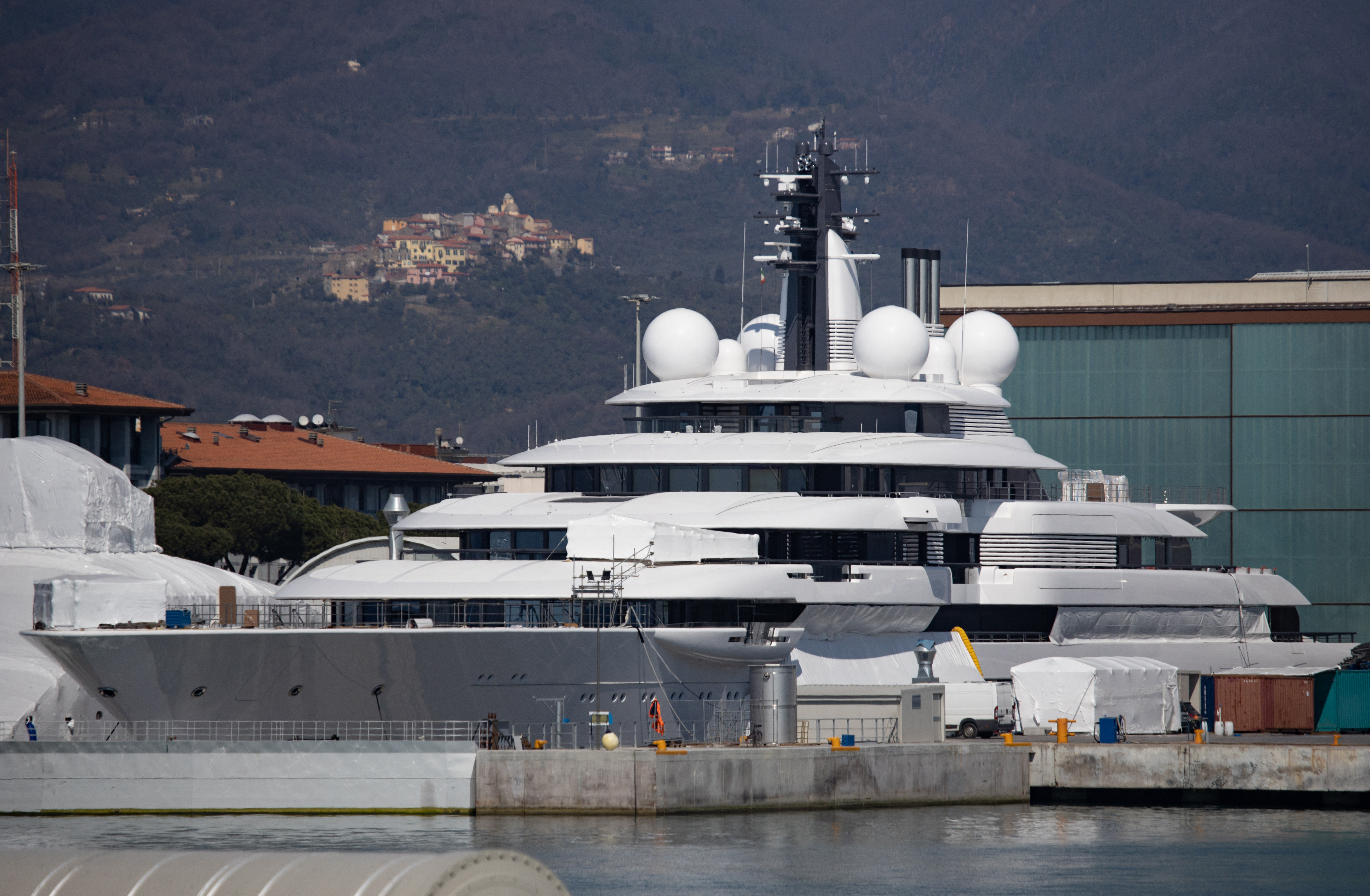 A view shows the multi-million-dollar mega yacht Scheherazade, docked at the Tuscan port of Marina di Carrara, Tuscany, on March 22, 2022. The ownership of the multi-million-dollar mega yacht Scheherazade, docked on the Tuscan coast, is currently the source of speculation that it belongs to a Russian oligarch, or even perhaps President Vladimir Putin himself. Ukrainian President Volodymyr Zelensky urged Italian lawmakers on March 22 to stop their country being a playground for Russia's elite, while warning food shortages sparked by the war risk a fresh migrant crisis. (Photo by Federico SCOPPA / AFP) (Photo by FEDERICO SCOPPA/AFP via Getty Images)