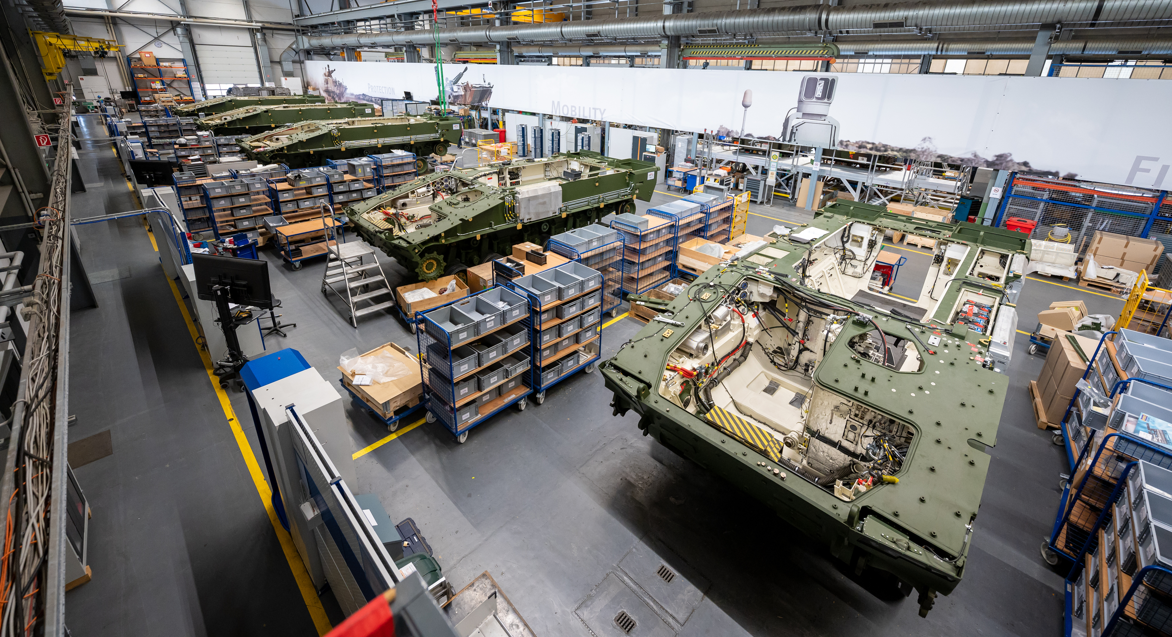 06 June 2023, Lower Saxony, Unterlüß: Lynx infantry fighting vehicles stand in a Rheinmetall production hall. Photo: Philipp Schulze/dpa (Photo by Philipp Schulze/picture alliance via Getty Images)