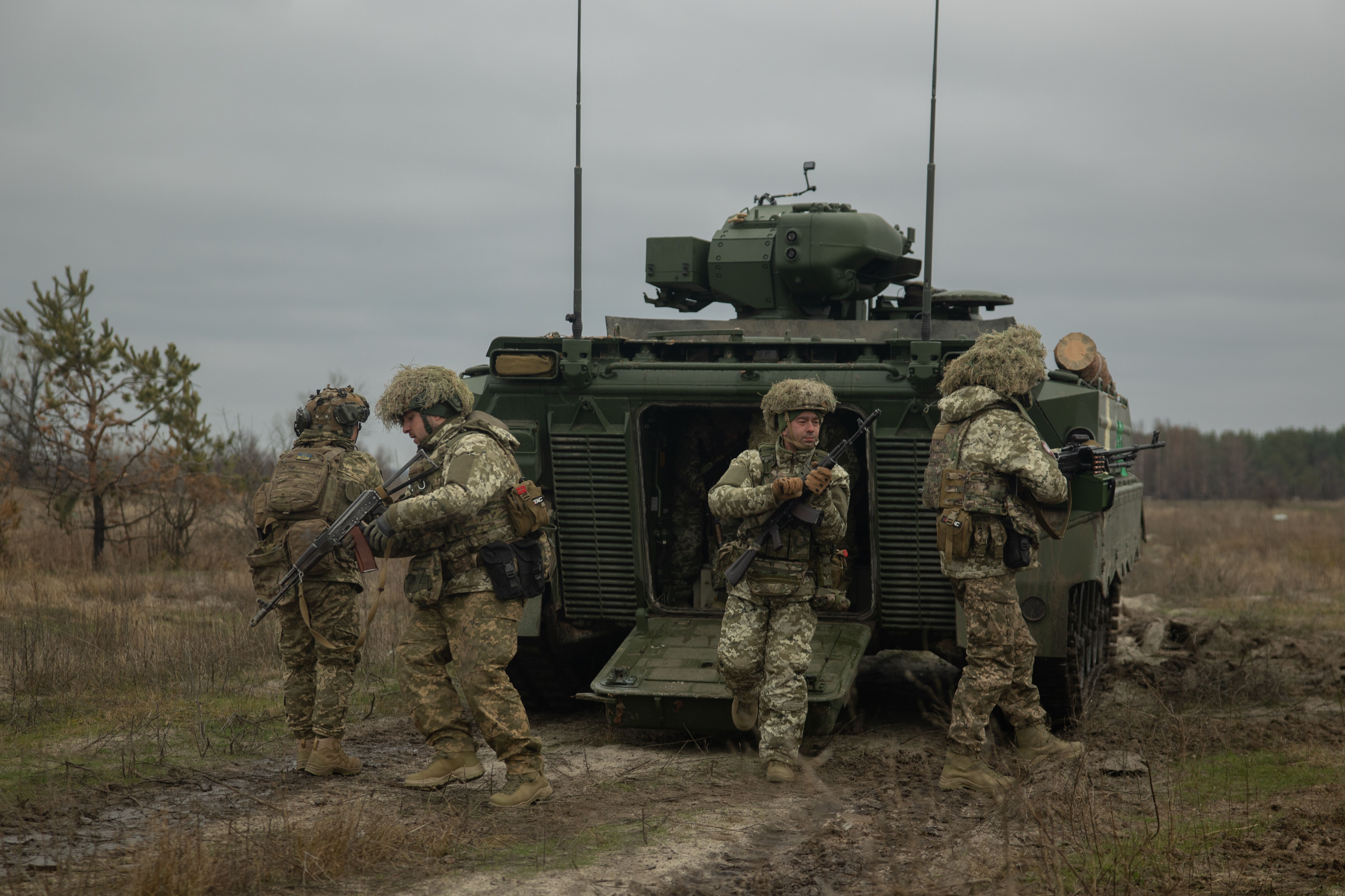 DONETSK OBLAST, UKRAINE - DECEMBER 7: Ukrainian soldiers exit an Marder Infantry Fighting Vehicle (IFV) on December 7, 2023 in Donetsk Oblast, Ukraine. Ukraine received armored vehicles as part of international military assistance programs to help defend itself against the ongoing Russian invasion. (Photo by Roman Chop/Global Images Ukraine via Getty Images)