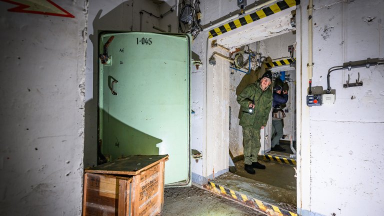07 October 2024, Brandenburg, Freudenberg: Hans-Jürgen Herget, organizer of guided tours of the former GDR Ministry of the Interior's command bunker, stands in the underground facility. The former command bunker of the GDR Ministry of the Interior near Freudenberg (Märkisch-Oderland) will be open to visitors next weekend (12 and 13 October 2024). "In the event of war, public life in the GDR was to be maintained from this bunker," explains Hans-Jürgen Herget. According to Herget, around 400 telephone lines led from the facility to the police, the National People's Army and the State Security, as well as to companies and fire departments. Photo: Patrick Pleul/dpa (Photo by Patrick Pleul/picture alliance via Getty Images)