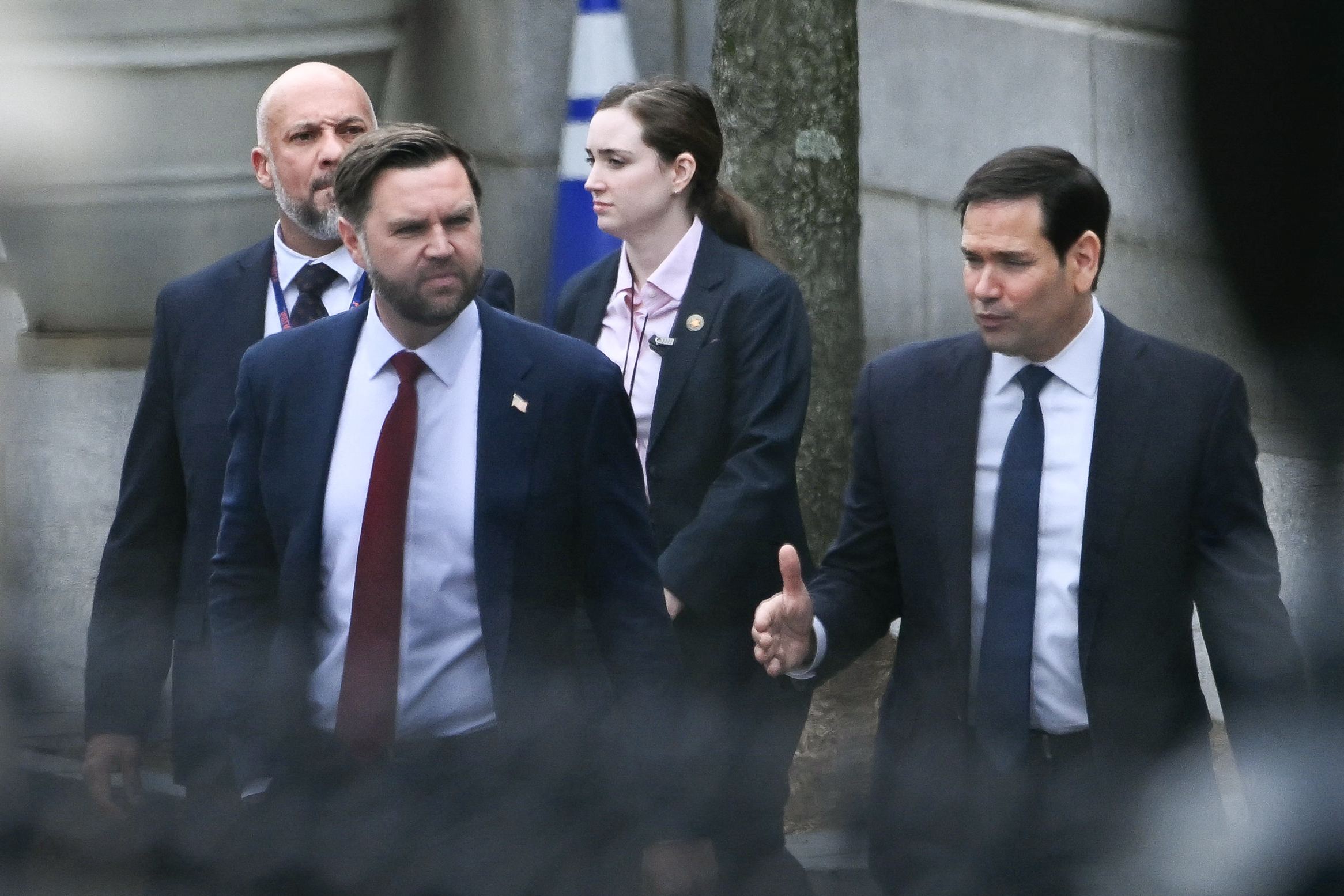 (L/R) US Vice President JD Vance and Secretary of State Marco Rubio depart the Eisenhower Executive Office Building on the White House campus after a meeting with Danish Foreign Minister Lars Lokke Rasmussen and Greenland's Foreign Minister Vivian Motzfeldt in Washington, DC, on January 14, 2026. US President Donald Trump insisted Wednesday the US needs to take control of Greenland, with NATO's support, just hours before talks about the Arctic island with top Danish, Greenlandic and US officials. Hours before the meeting with US Vice President JD Vance was due to start, Trump said that US control of Greenland -- an autonomous territory belonging to NATO ally Denmark -- was "vital" for his planned Golden Dome air and missile defense system. (Photo by Brendan SMIALOWSKI / AFP via Getty Images)