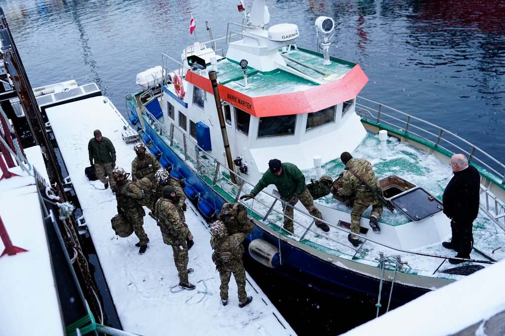 Danish soldiers disembark at the port in Nuuk, Greenland, on January 18, 2026. The Danish Defense will continue the increased presence with exercise activities together with a number of NATO allies in and around Greenland in 2026. This is done in cooperation with the Greenlandic authorities and the Greenlandic government, Naalakkersuisut, as stated by the Danish Defense. (Photo by Mads Claus Rasmussen / Ritzau Scanpix / AFP via Getty Images) / Denmark OUT