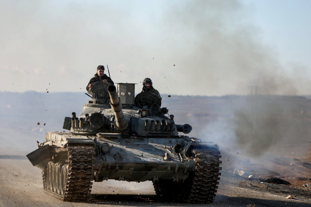 Syrian government forces make their way to the city of Hasakeh in northeastern Syria on January 20, 2026. The Kurdish-led Syrian Democratic Forces said they were committed to a four-day ceasefire deal announced by the Damascus authorities as part of an understanding reached on January 20. (Photo by Bakr ALKASEM / AFP via Getty Images)