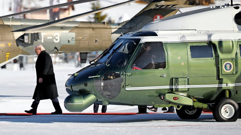 DAVOS, SWITZERLAND - JANUARY 21: U.S. President Donald Trump disembarks Marine One as he arrives in Davos to attend the World Economic Forum (WEF), on January 21, 2026 in Davos, Switzerland. The annual meeting of political and business leaders comes amid rising tensions between the United States and Europe over a range of issues, including Trump's vow to acquire Greenland, a semi-autonomous Danish territory. (Photo by Chip Somodevilla/Getty Images)