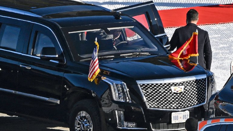 President Donald Trump climbed into a heavily armored Cadillac Escalade presidential limo after arriving in Davos in Switzerland to attend the World Economic Forum this morning.