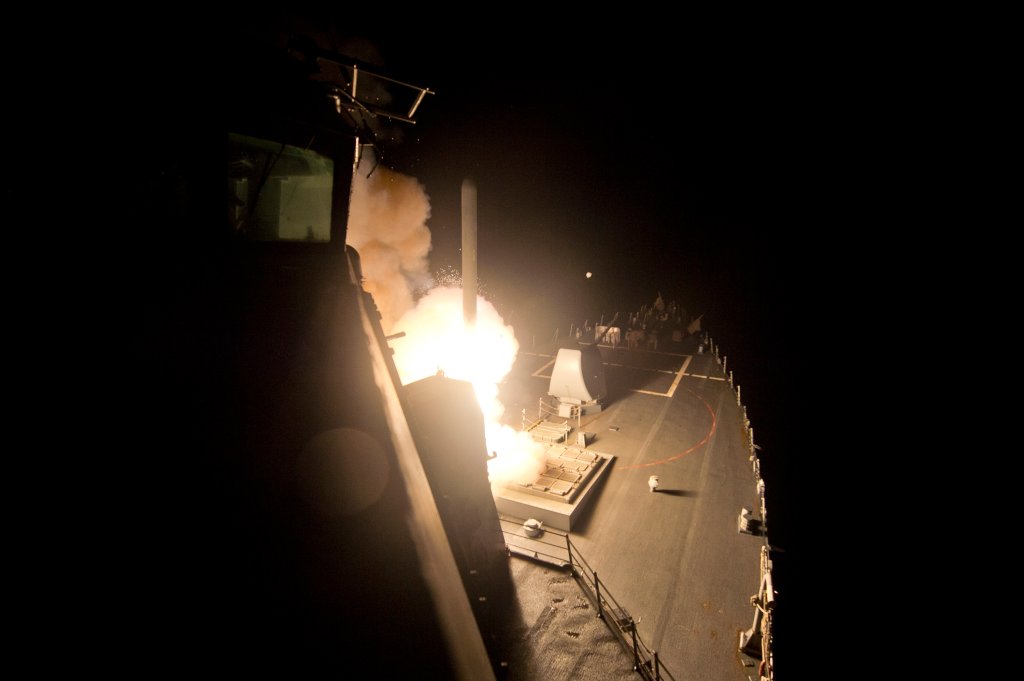 The guided-missile destroyer USS Arleigh Burke (DDG 51) launches Tomahawk cruise missiles to conduct strikes against ISIL targets. Arleigh Burke is deployed in the U.S. 5th Fleet area of responsibility supporting maritime security operations and theater security cooperation efforts. (U.S. Navy photo by Mass Communication Specialist 2nd Class Carlos M. Vazquez II/Released)
