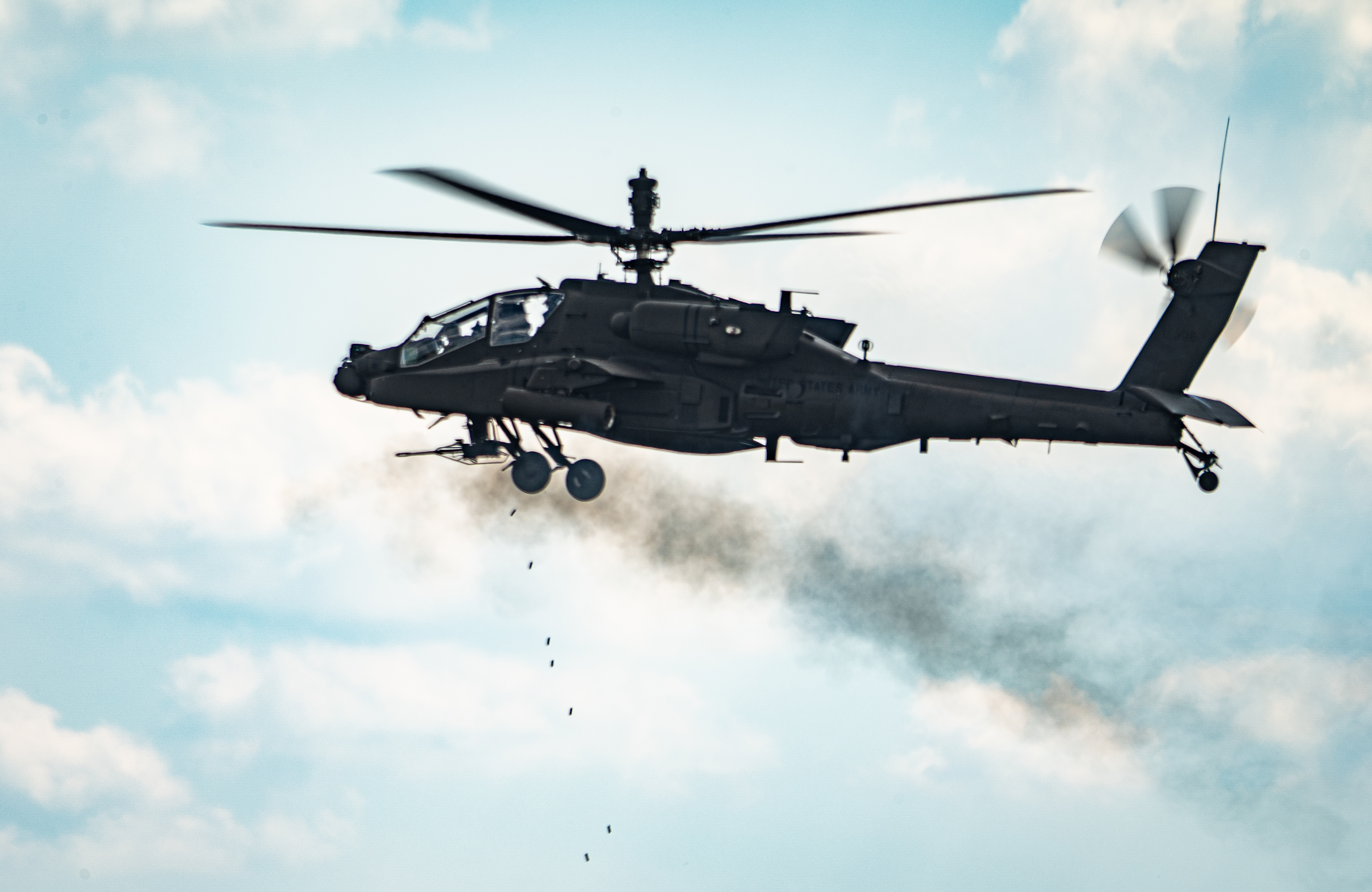 U.S. Soldiers with the 1-151st Attack Reconnaissance Battalion, 59th Aviation Troop Command, South Carolina National Guard, conduct their annual aerial-gunnery qualification table at the Poinsett Range, Sumter, South Carolina, May 22, 2024. Aircrews fired both 30mm rounds and rockets, the training allowed Soldiers to sharpen their armory skills, communication and team work with their assigned AH-64 Apache helicopters. (U.S. Army National Guard photo by Sgt. Tim Andrews)