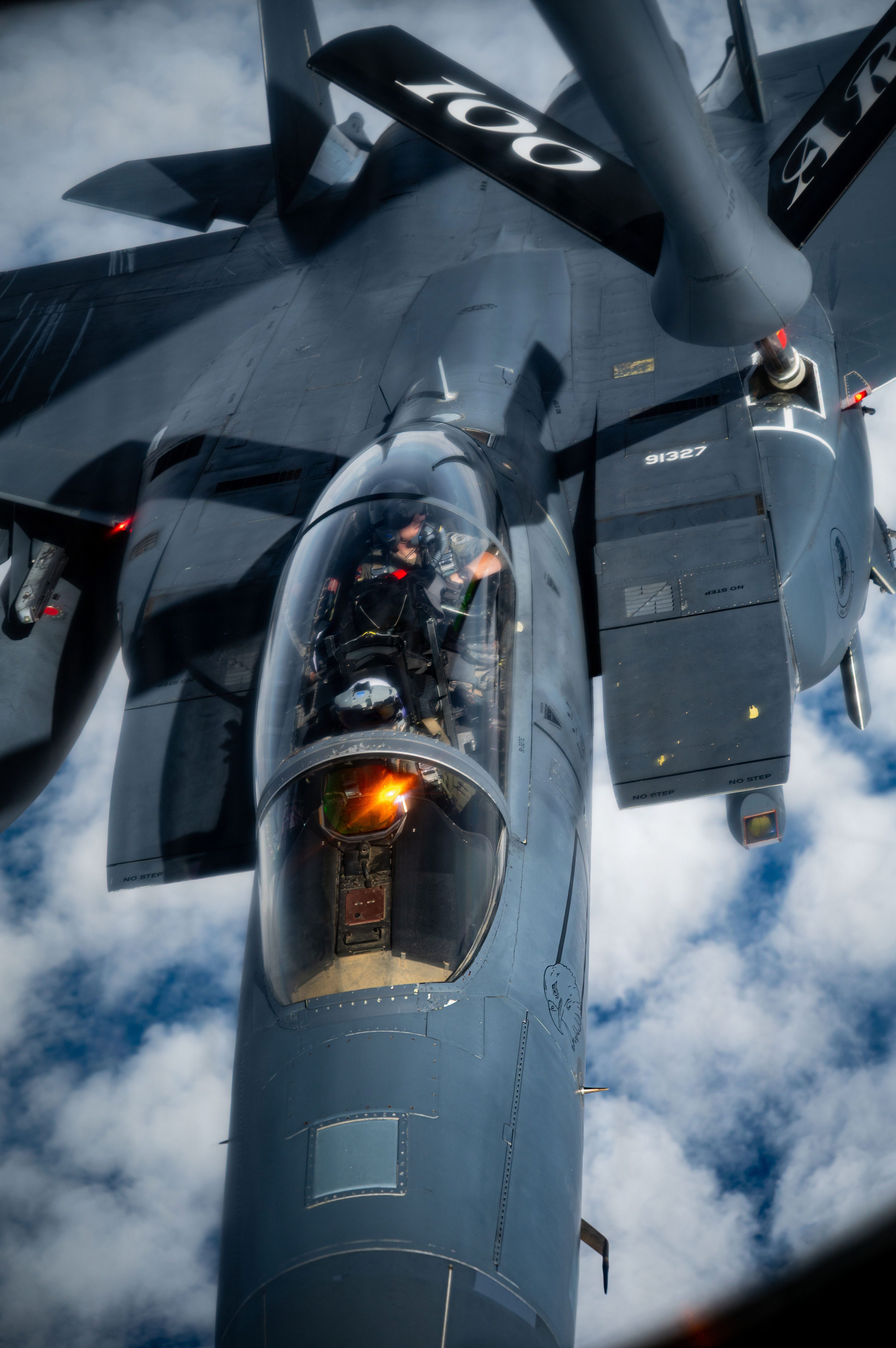A U.S. Air Force F-15E Strike Eagle from the 48th Fighter Wing, RAF Lakenheath, approaches a KC-135 Stratotanker from the 100th Air Refueling Wing during exercise Ocean Sky, over the Atlantic Ocean, Oct. 15, 2025. The F-15E provides the joint warfighter unprecedented global precision attack capability against current and emerging threats, while complementing the Air Force’s air superiority fleet. (U.S. Air Force photo by Airman 1st Class Chloe Masey)