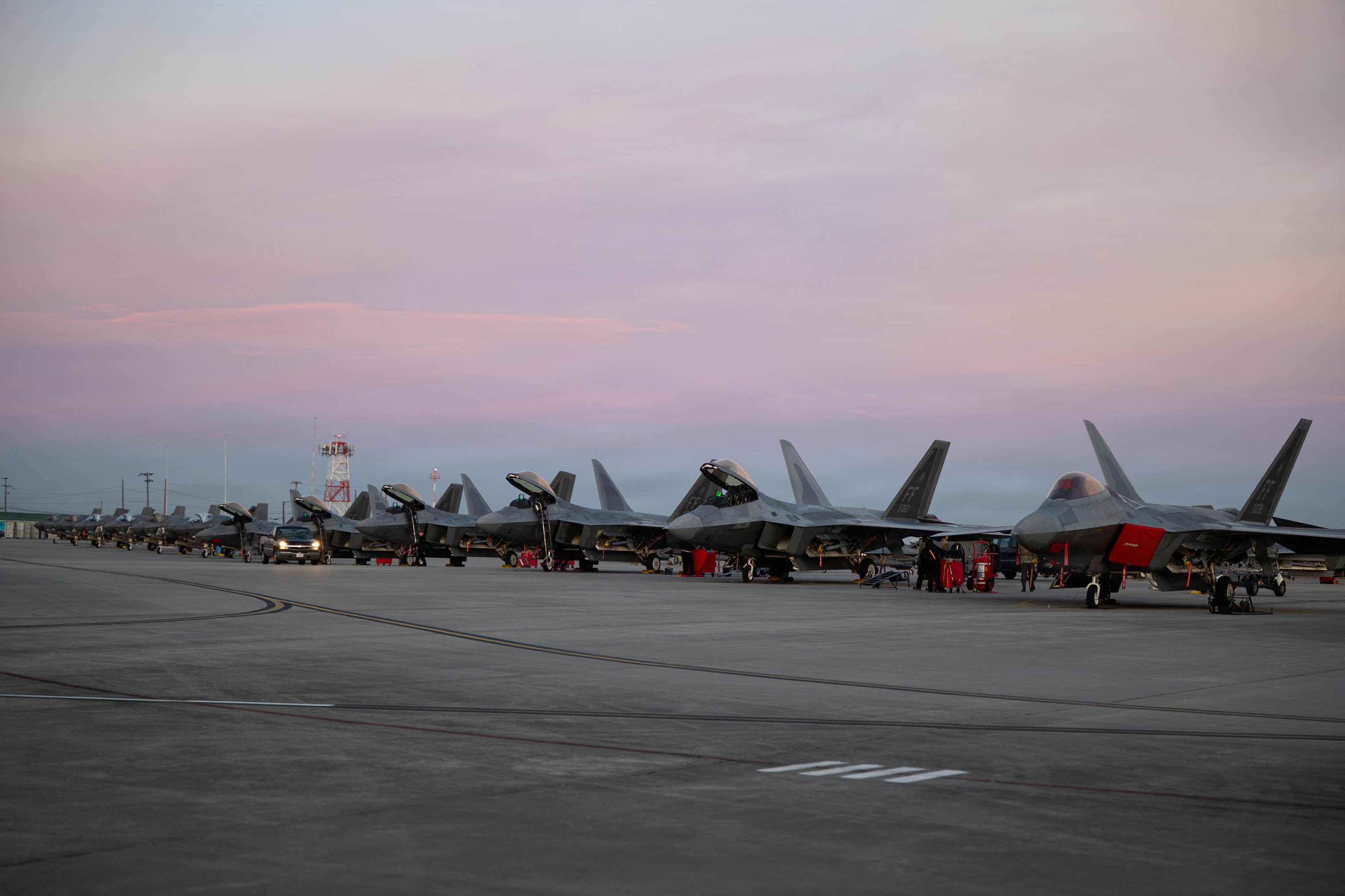 U.S. Air Force F-22 Raptors assigned to the 1st Fighter Wing, Joint Base Langley-Eustis, Virginia, and F-35 Lightning II’s assigned to the 33rd Fighter Wing, Eglin Air Force Base, Florida, sit on the flightline of the Georgia Combat Readiness Training Center (CRTC) during exercise Sentry South 26.1 at the Savannah Air National Guard Base, Georgia, Jan. 23, 2026. Sentry South 26.1 in Savannah is an Air National Guard-led counterair exercise held at the Georgia CRTC, also known as the Air Dominance Center, that trains hundreds of participants annually in offensive and defensive counterair missions with 4th- and 5th-generation aircraft to enhance combat readiness and joint integration. (U.S. Air National Guard photo by Staff Sgt. Josiah Meece).